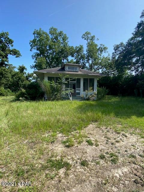 Old time charm with nice front porch in the city of Malone Florida. Home is damaged from Hurricane Michael and needs work.  Room measurements may be incorrect so if important to you take new measurements or bring a contractor with you to measure.