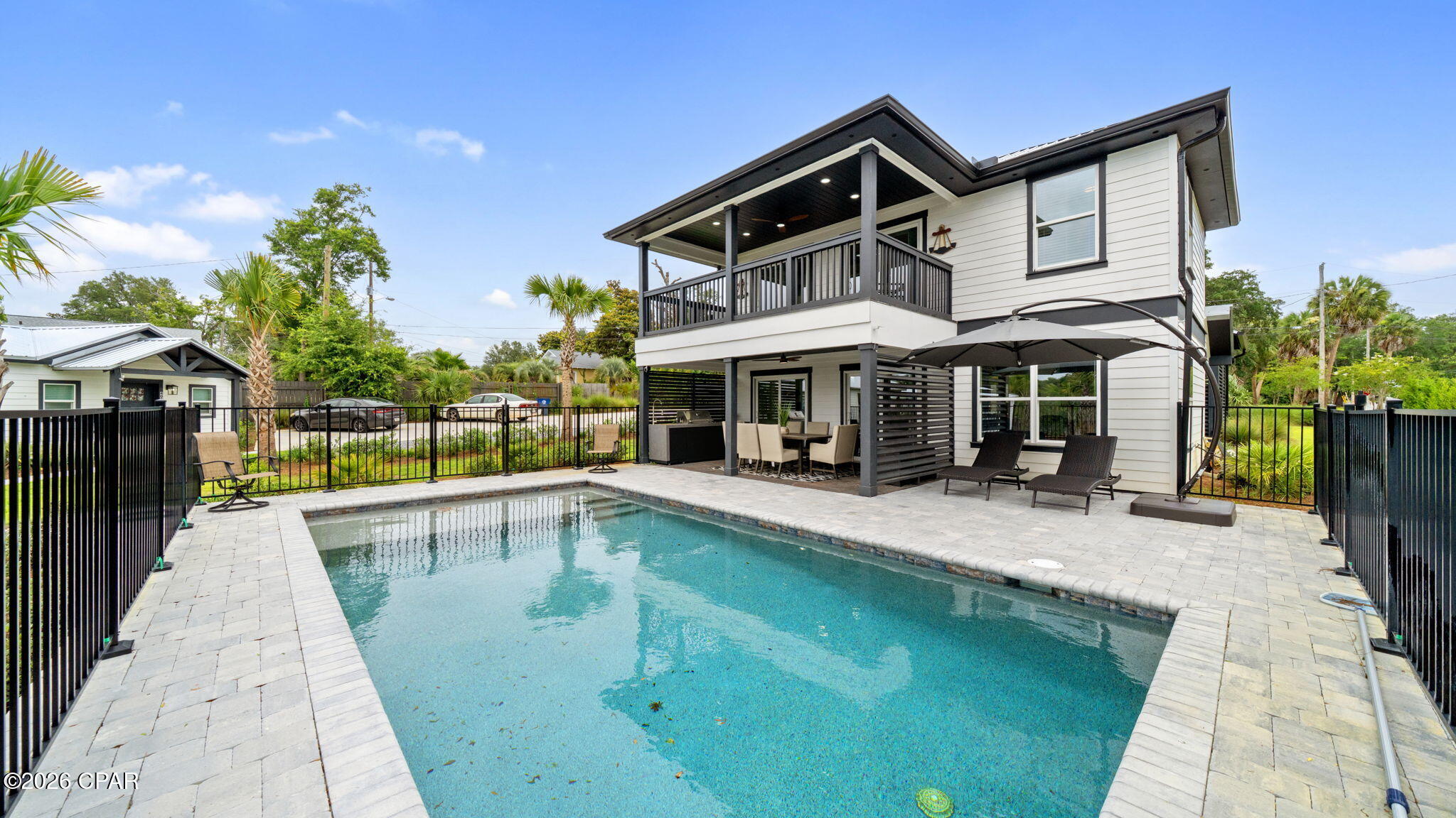 Waterfront masterpiece with deep water access to the Bay and the Gulf of Mexico.
This property is the most versatile home in Panama City with virtually unlimited uses.
Perfect for a primary residence or second home.  Also, the potential for massive short term rental opportunity exists.  Sold fully furnished with all new furnishings.

401 Massalina Drive is under a lease for 5 months with potential for 2 month extension.  $3600 per month and includes utilities and pool service.

Built in 2025, this 3-bedroom 2-bathroom with den/office offers gorgeous views from covered porches on both floors. First floor has open kitchen with Forno Italian stainless appliances, large Island, gas stove, double door refrigerator with ice maker and wine cooler. The living / dining walks out large sliding doors to covered porch, outdoor Thor stainless summer kitchen and pool/bayou views. Master bedroom and master bath with large custom shower, double vanity sink and walk in closet. Second floor open family room, den/office, large sliding doors to walk to walk out to covered porch overlooking pool/bayou. Two additional bedrooms and one bath. So much to offer with beautifully designed tile flooring throughout, tankless water heater and extra storage. New custom landscaping and pool to relax and enjoy. Beautiful decking, shared dock with fish cleaning station. Location is easy to access to newly renovated downtown entertainment with shopping, dining, concerts and ongoing festivities.