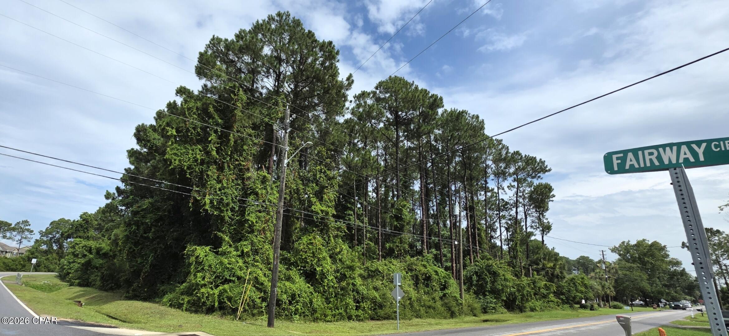 Build your dream home in the desirable Colony Club area of Panama City Beach on this corner lot! This residential home site is ideally located just minutes from the white-sand beaches of the Gulf, Pier Park, shopping, dining, entertainment, and top-rated golf courses. Situated in an established neighborhood, this lot offers the perfect opportunity to create a custom home while enjoying the convenience of nearby schools, parks, and everyday amenities. Whether you're looking to build a primary residence, second home, or investment property, this centrally located lot provides easy access to all that Panama City Beach has to offer. Don't miss your chance to own a piece of paradise on the Emerald Coast! 
Buyer to verify all information deemed important, including build ability, zoning, setbacks, utilities, HOA requirements, and suitability for intended use.