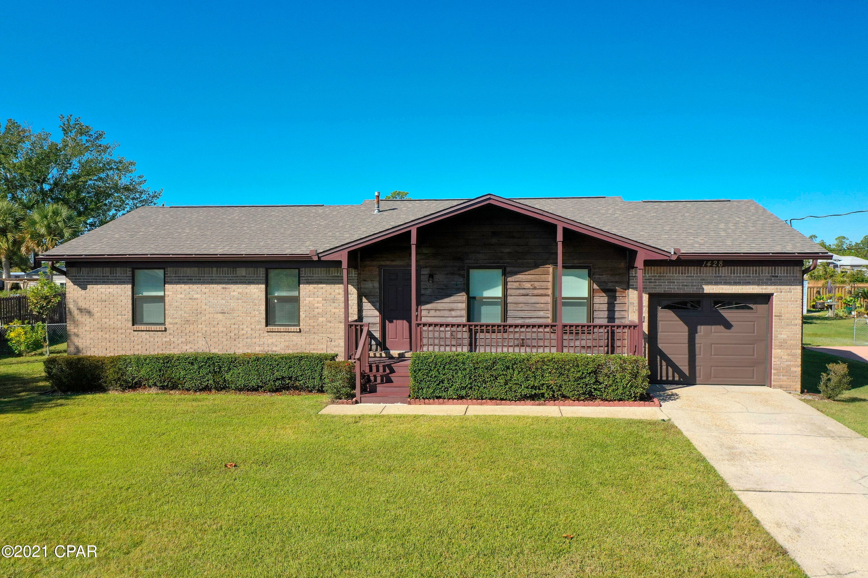 CURRENTLY UNDER CONTRACT, SELLER ACCEPTING BACKUP OFFERS.          

    CLOSE TO TYNDALL AFB AND SEVERAL BOAT RAMPS, THIS SWEET, BEAUTIFULLY MAINTAINED BRICK HOME IS WAITING FOR YOU! Hurricane Michael did very little damage to this home, which has never flooded. The roof was replaced in 2019 along with new insulation in the attic and crawl space. New double insulated windows were installed throughout, to include a new sliding glass door with blinds between the glass that leads out to the 10x12 deck. The deck overlooks the big, beautifully manicured backyard and is the perfect location to enjoy the sunsets!!  There is also a gas spigot conveniently located there for your grill! The kit has new granite countertops, lots of space for food prep and tons of cabinets, plus a pantry. The kit is open to the family room that has a fireplace with a stone surround and a cathedral ceiling that makes it feel extra spacious. There is a large living room with a coat closet, plus there is a large closet in the hall and a linen closet! Bathrooms have new solid surface countertops. Two of the bedrooms have brand new carpet and have walk-in closets. The third bedroom is tiled and has a large closet. Ceiling fans throughout. Single car garage is oversized and has an insulated garage door and a personnel door for access to the backyard.  There is a shallow well for the sprinkler system, so you can keep the yard beautiful without going broke with water bills. Age, sq ft,  room sizes, lot size are all estimates and should be verified if concerned. legal description, PID will need to be verified by Title.