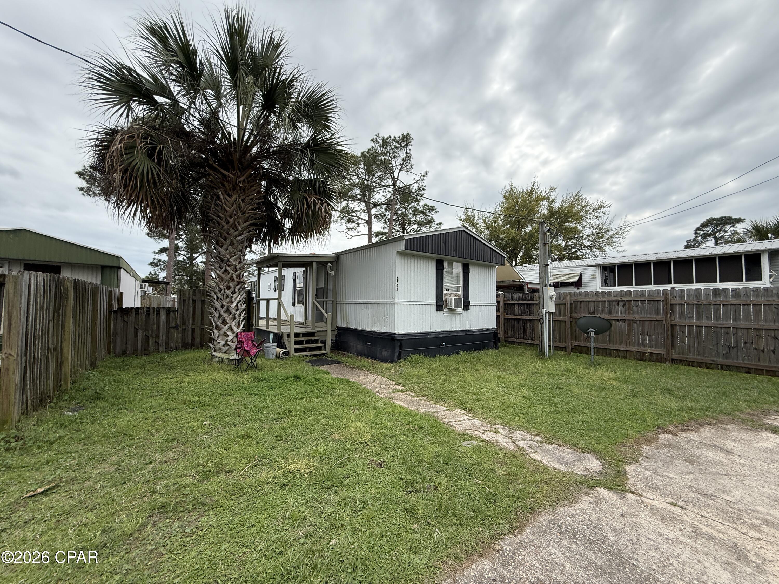 **lot is included** Reduced for a quick sale. Enjoy coastal living at its best in this recently updated 3 bedroom 2 bathroom mobile home located in desirable Panama City Beach. Just a short walk to a convenient boat ramp and Bayside Marina, this property offers easy access to North Bay, perfect for boating, fishing, and soaking in beautiful waterfront sunsets.
Inside, you'll find a comfortable and functional layout with a spacious living area, a bright kitchen with ample cabinet space, and a split bedroom floor plan for added privacy. Whether you're looking for a full time residence, fishing camp, vacation getaway, or investment opportunity, this home offers location, convenience, and value.
Don't miss your chance to own a slice of paradise just minutes from the bay!