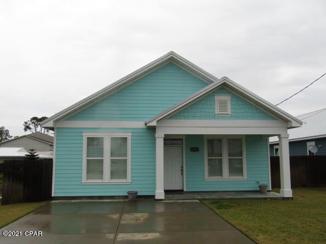 Walk to the beach from this 3 bedroom, 2 bath home featuring split bedroom floor plan, open kitchen with stainless steel appliances and island,granite countertops, open patio leading to large fenced back yard. Engineered wood floors in living, dining, kitchen and hall. Washer/dryer  and pool box are AS IS. Property is on septic system. ** $250 pet deposit/$50 pet fee/$25 month pet rent.