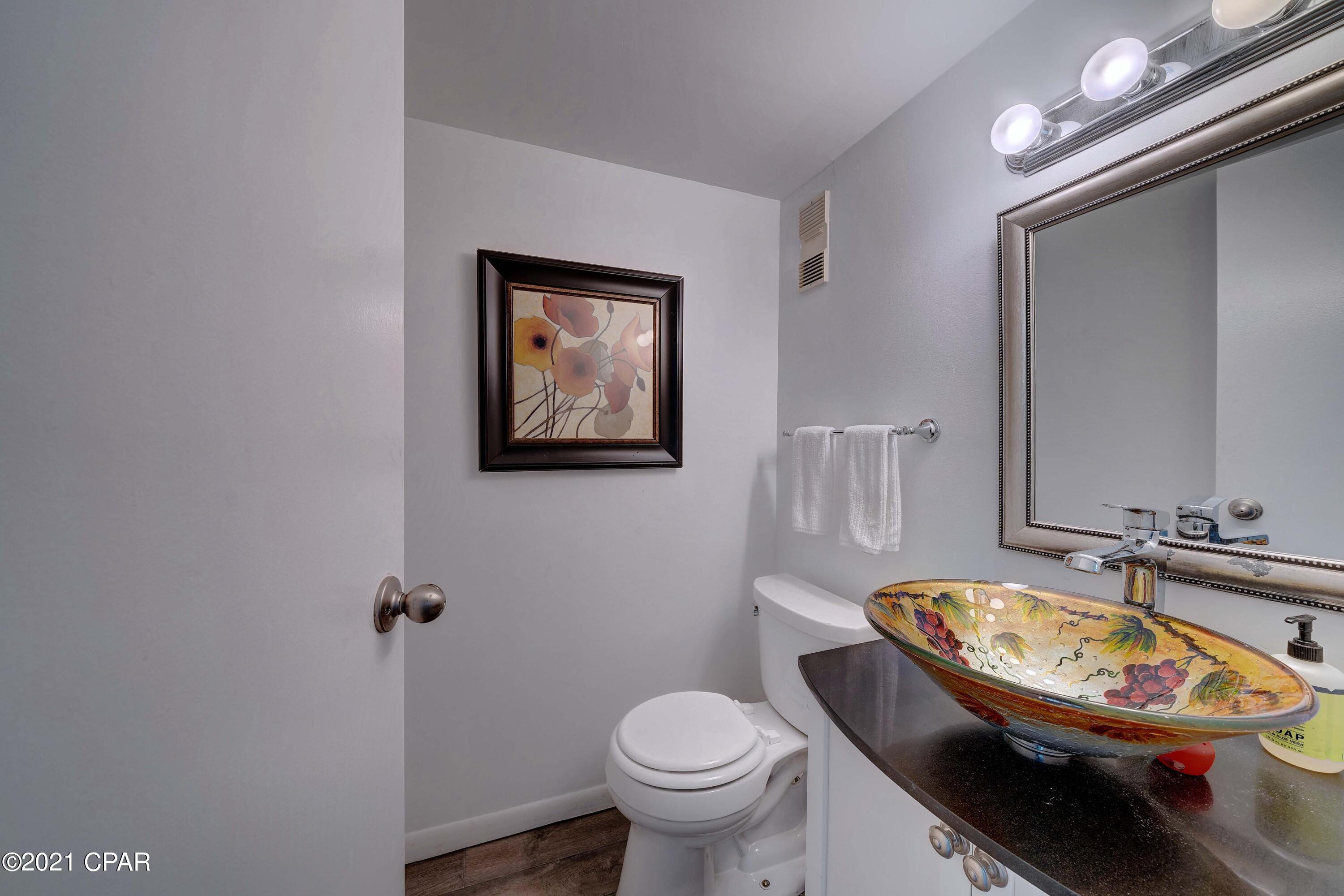 Completely remodeled and updated condo located in the prestigious Bay Point golf villas.  Master bath shower has art deco tile work on shower wall - you will feel like you are bathing in the ocean.  Guest bath has a jacuzzi tub and unique shower door.  Kitchen counter is blue pearl granite paired with a white glass backsplash and high end white cabinetry.  All brand new appliances.  The staircase was completely replaced with real wood and stained dark mahogany.  All new ceilings and most of the walls.  The main floor has brand new Florida style wood grain ceramic tile flooring throughout.  All new light fixtures. Gated community - 24 hour roving security - tennis courts - restaurants - deep water marina just minutes from the open Gulf of Mexico.
