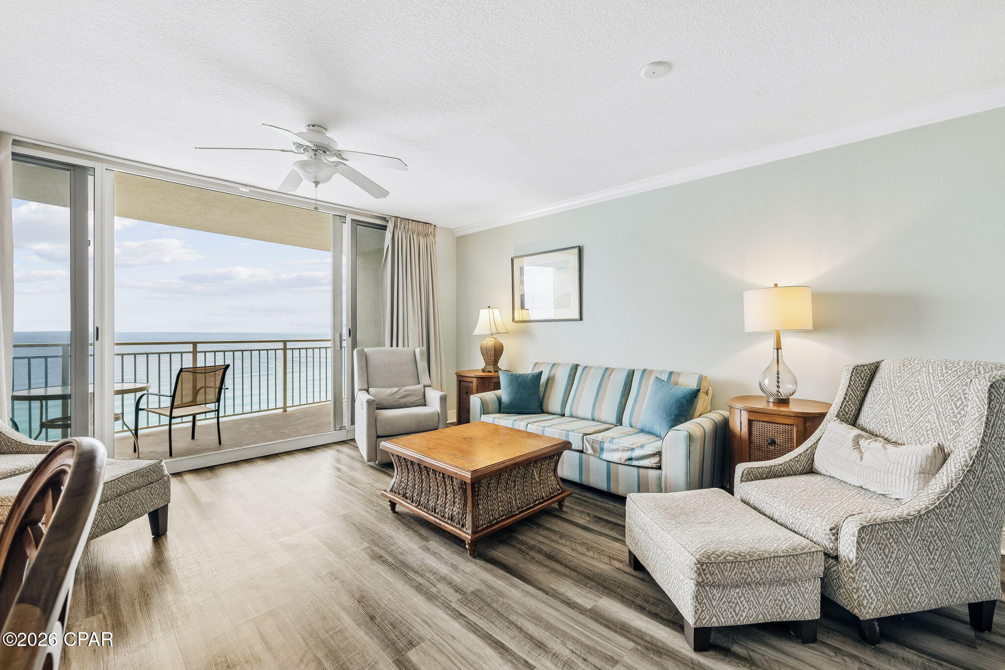 Set within Emerald Beach Resort, Gulf views from the 15th floor hit differently -unobstructed, elevated, and framed by 8-foot sliding glass doors that run across the main living area and open onto a spacious private balcony. The kitchen, dining nook, and living space are all oriented toward the water, so the view is part of the everyday experience, not just a balcony feature.

At nearly 800 square feet, the layout is efficient without feeling tight. LVP flooring runs through the main areas, tile in the kitchen and bath - low-maintenance and built for beach life. A long granite breakfast bar anchors the kitchen and adds seating while keeping the space open.

Sleeping is dialed in for groups: a king primary bedroom, hallway bunks, and a queen sleeper sofa accommodate up to six comfortably. The bathroom's dual-entry design gives the primary bedroom direct access while remaining accessible from the hall.

The HOA covers water, sewer, trash, high-speed internet, and insurance - keeping the ownership picture straightforward for investors and second-home buyers alike.

On-site amenities cover the full range: gulf-front seasonally heated pool, zero-entry pool, hot tubs, kids' splash zone, fitness center with steam and sauna, game room, water sports rentals, poolside tiki bar, Starbucks, ice cream shop, sundry store, beach service, high-speed elevators, 24/7 security, and covered parking. If you do decide to head out, you're within walking distance to popular local dining, shops, and attractions, with Pier Park about a mile away.

Easy to enjoy, easy to maintain, and in a spot people come back to year after year. Reach out to take a closer look.