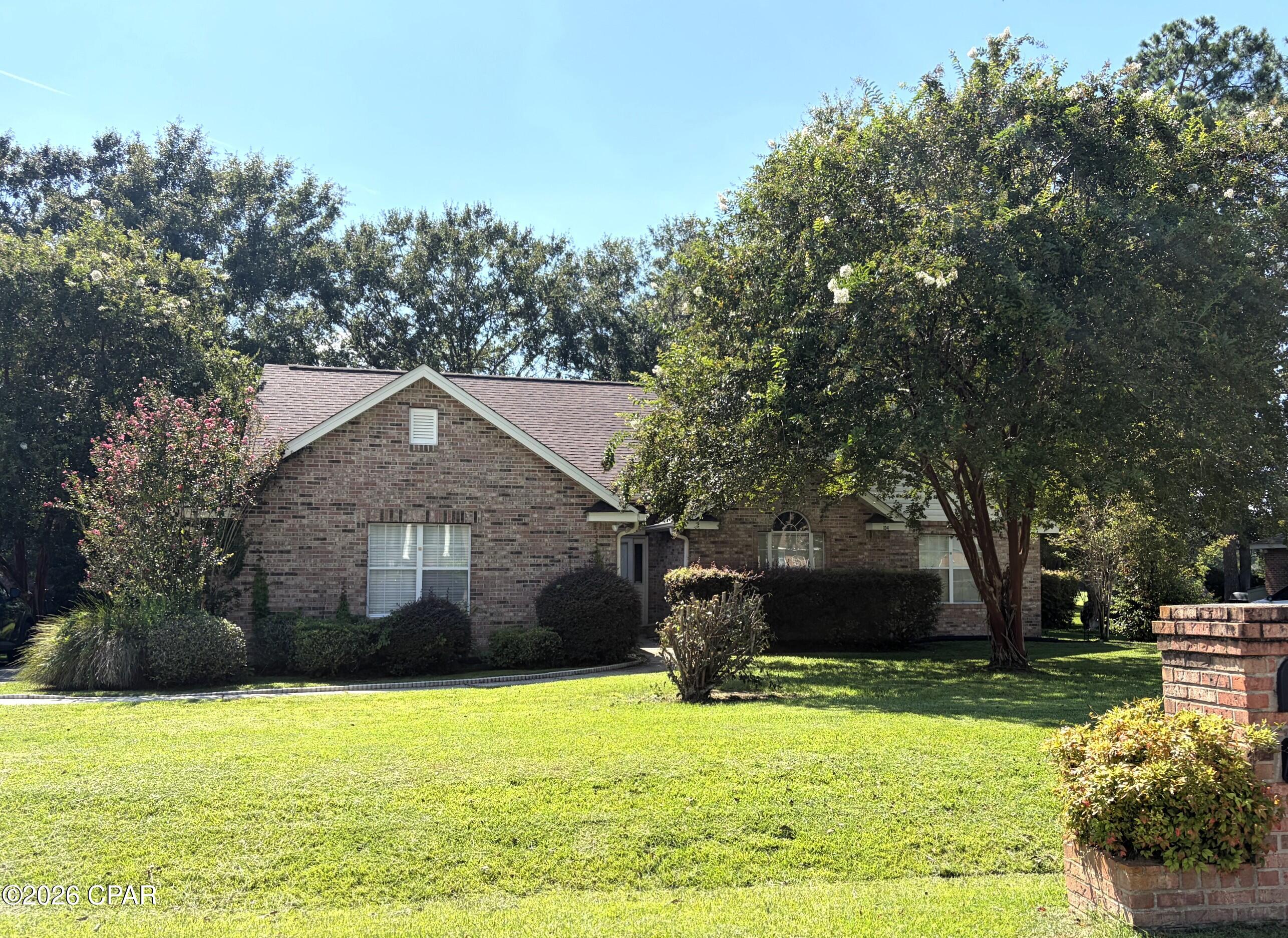 GOLF COURSE LIVING AT ITS BEST! Beautiful brick 3-bedroom, 2-bath home situated directly on the golf course in desirable Country Club Estates II. Set on approximately half an acre beneath a canopy of mature trees, this well-maintained home offers 2,077 square feet of heated living space and a peaceful setting with beautiful views.

Step inside to a welcoming foyer with soaring vaulted ceilings and beautiful hardwood floors that continue through the main living areas. The spacious floor plan features a remarkably large primary suite with its own comfortable sitting area--a wonderful retreat with plenty of room to relax, read, or create a private sitting space.

The bright enclosed sunroom provides an inviting extension of the living space and opens onto an additional patio accessible from both the living room and sunroom. Together, these spaces create a wonderful setting for morning coffee, relaxing afternoons, or entertaining while enjoying the golf-course surroundings.

Additional features include three spacious bedrooms, two full baths, a two-car garage, mature landscaping, and an architectural shingle roof installed in 2019. French doors and abundant windows bring natural light into the home while taking advantage of the beautiful outdoor setting.

Conveniently located in Havana, just minutes from downtown and an easy drive to Tallahassee, this is the kind of property that offers the best of both worlds: a peaceful golf-course setting, generous living spaces, and the warmth and character of an established brick home.

Come see why 104 Greenway Drive is such a special place to call home!