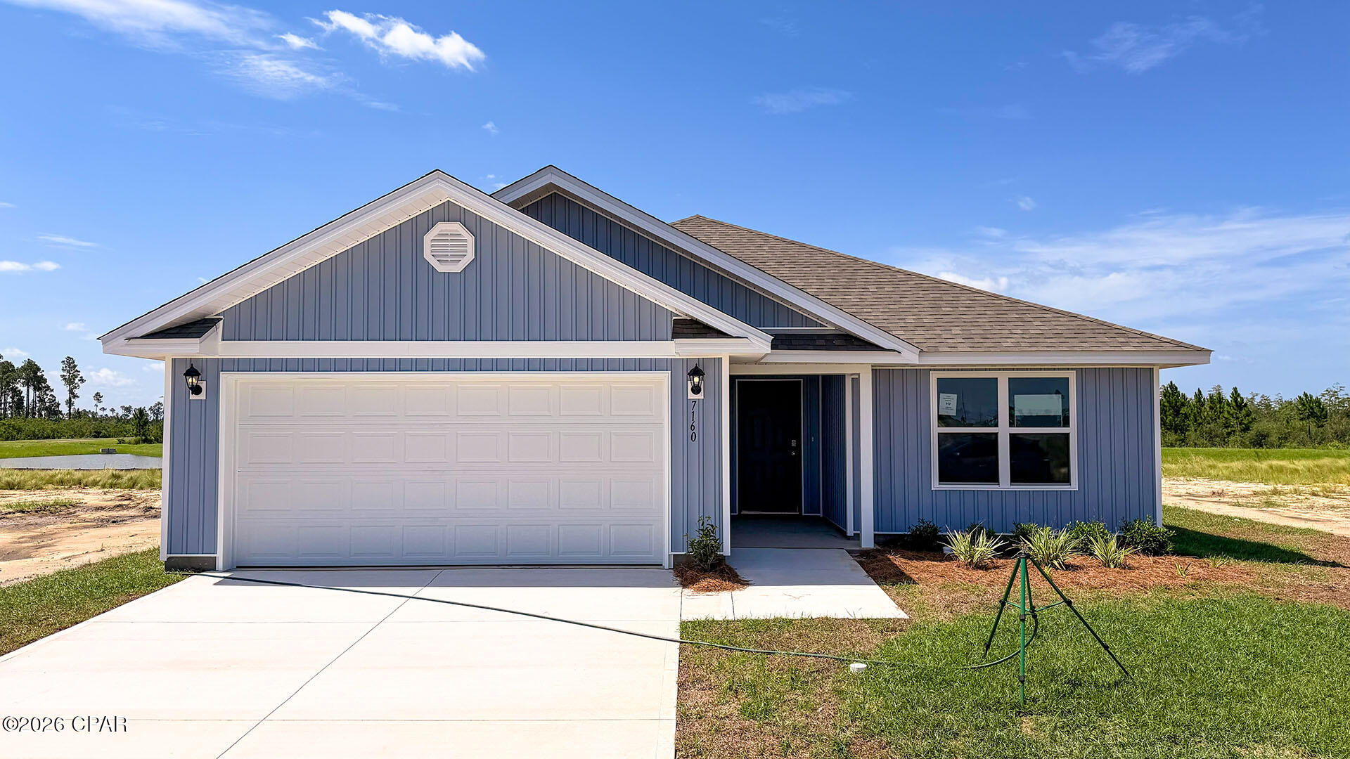 Welcome to the Lismore, a new home floor plan located at Liberty in Panama City, Florida. The Lismore is thoughtfully designed 3-bedroom, 2 bathroom, one-story home with 1.580 square feet of modern living. On the outside of your home, you will see durable vinyl siding, a spacious two-car garage with an opener and a fully sodded yard to the property lines. This home comes equipped with dimensional shingles with a limited lifetime warranty, electronic deadbolts on all exterior doors, weatherproof outlets, and hose bibs. Sidewalks line the neighborhood streets for you to enjoy the beautiful Florida weather at Liberty. Inside you will see 8' ceilings throughout, engineered vinyl plank flooring throughout the home and carpet in the bedrooms. The front bedrooms, bathroom, and garage are close to the front door and welcome you into an open living room and kitchen, perfect for having guests over and enjoying the lovely water views. Granite countertops, white cabinetry with soft-close are in the kitchen and bathrooms, and the kitchen island make hosting or serving dinner at the bar a breeze. Complete with a pantry, and stainless-steel appliances including smooth top range, microwave, and dishwasher means your kitchen is fully equipped. The living room has plenty of windows for natural lighting and leads right to the back door. Each bedroom comes with soft carpet floors and spacious closets. The Primary Bedroom features a bathroom with a detached shower and double vanity with granite countertops. The walk-in closet is adjacent to the bathroom, meaning more space in your bedroom. As with all the homes in Liberty, your home is outfitted with the latest Smart Home technology allowing you to manage your home right from your phone, making your comfort easy and exceptional. Our Liberty community features underground utilities making it less susceptible to damage from severe weather leading to fewer outages and more reliable service. Residents of Liberty can enjoy exclusive access to two amenity centers, complete with two pools, a children's splash pad, two playgrounds for endless fun, a well-equipped gym, poker room, yoga room, two pickle ball courts, basketball court, and a well-equipped fitness center. Embrace the lifestyle you deserve where every detail is curated for your ultimate enjoyment.