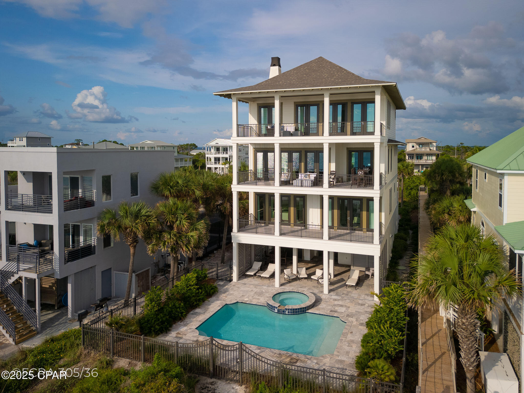 UNDER CONTRACT, SELLER IS ACCEPTING BACKUPS! Gulf front luxury on Cape San Blas. Custom built by Windolf Construction, this 5 bedroom, 5 full bath, 2 half bath home offers 4,505 square feet of heated and cooled living space. A one owner property, it has never been used as a vacation rental. Enjoy a heated pool with attached hot tub, private beach access, custom gated entry, and two separate garages. Covered and open lounging areas surround the pool, creating the perfect space for outdoor living. Inside, professionally designed décor and art from a Tallahassee interior designer complement light filled living areas and stunning Gulf views. Located on Clearwater Drive, this property offers privacy and seclusion while remaining close to Cape San Blas shops and dining, and just a short drive to St. Joseph Peninsula State Park. Experience a lifestyle where mornings begin with walks on the beach, afternoons are spent by the pool, and evenings end with unforgettable sunsets over the Gulf.