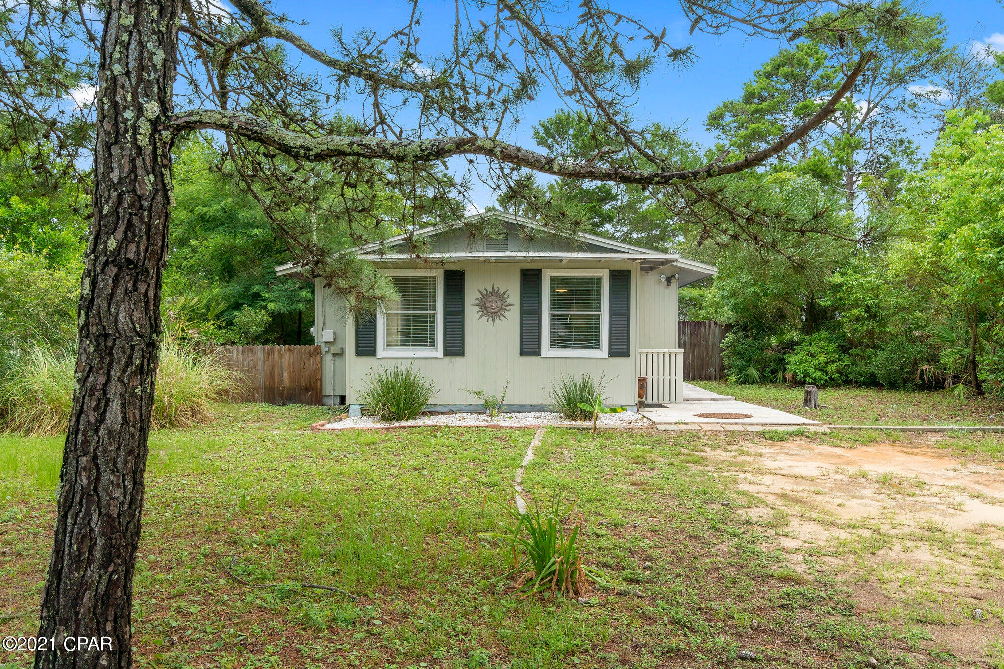 Rare opportunity in this price range and location. Charming beach bungalow located on the highly desirable west end of PCB. This beach home is sold furnished and ready for use on day one. Home features two bedrooms, one bath, spacious kitchen and living room. Home is in need of exterior repairs, sold as-is, cash only. Call Kelly or Mark for details.