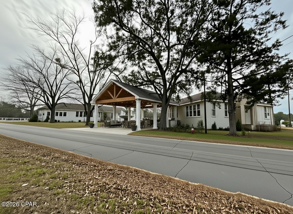 Situated on more than an acre of land just North of Marianna, this expansive multifamily property presents a rare opportunity for visionary investors and developers. With substantial square footage and multiple private entrances, the layout offers incredible flexibility for a wide range of future uses. While renovations are needed, the possibilities here are truly exceptional.

Reimagine the space as income-producing apartments, an assisted living facility (ALF), childcare center, vendor marketplace, or explore redevelopment options such as creating a mobile home park. The existing structure provides a strong foundation for transformation, and the center portion could potentially be removed to create a stunning courtyard or outdoor entertainment area--adding both value and appeal.

Due to the size and multiple-entry configuration of the building, bedroom and bathroom counts will need to be verified, offering buyers the opportunity to design and configure the space to meet their specific needs.

Enjoy the peace and privacy of a rural setting while remaining conveniently located approximately one hour from Dothan, Tallahassee, and Panama City. This strategic location provides tranquil surroundings without sacrificing access to major employment centers, shopping, dining, and other NWFL attractions.

Bring your vision and unlock the tremendous potential this unique property has to offer!