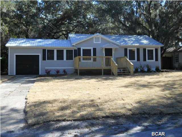 This is a wonderful opportunity to own a completely remodeled Cove home. From the time you drive up to this wonderful Cove cottage, the new metal roof and new vinyl siding let you know there will be NO maintenance required when owning here. The interior offers beautifully stained hardwood floors, new bathroom, new kitchen and more. While the square footage may be a bit small, the floorplan is open and laid out for a family.