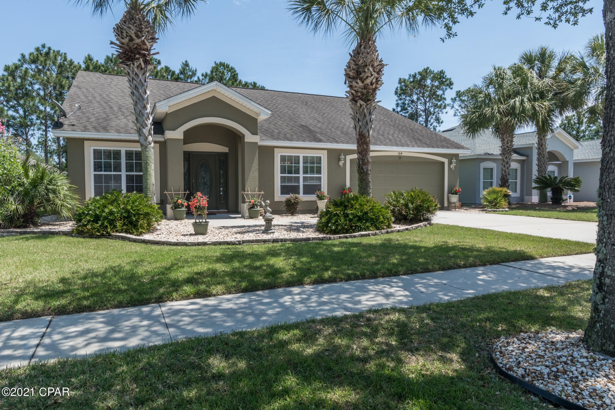 CURRENTLY UNDER CONTRACT, SELLER ACCEPTING BACKUP OFFERS' Amazing 4 bedroom 2.5 bath Pool home in desirable Palmetto Trace.  Home is immaculate.  Kitchen includes granite counter tops and back splash, custom cabinetry, breakfast bar. Large breakfast nook  as well as a beautiful formal dining room open to  spacious  family room leading to screened in pool for your enjoyment and entertaining.   Master bedroom will accommodates king suite nicely, also offers his/her separate walk-in closets. Master bath double vanity, large linen closet and large tile shower. Beautiful flooring and crown molding. Curb appeal is so welcoming.   Two car garage w/ attic space. Palmetto Trace has lighted sidewalks throughout the community and two community pools.  Located across from Pier Park. All dimensions are approx.