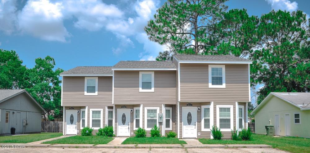 2 bedroom, 1.5 bath townhome in Lynn Haven! Walking distance to Publix, Starbucks, Waffle House and much more! There are 2 bedrooms (carpeted) and a full bathroom (ceramic tile) upstairs. Main level features all ceramic tile with a living room, dining area, 1/2 bath, and laundry. The kitchen features custom cabinets, granite counter tops, and stainless steel appliances. There is a screened patio overlooking the fenced backyard. 2 parking spaces in front of the unit. LAWN maintenance included in the rent.