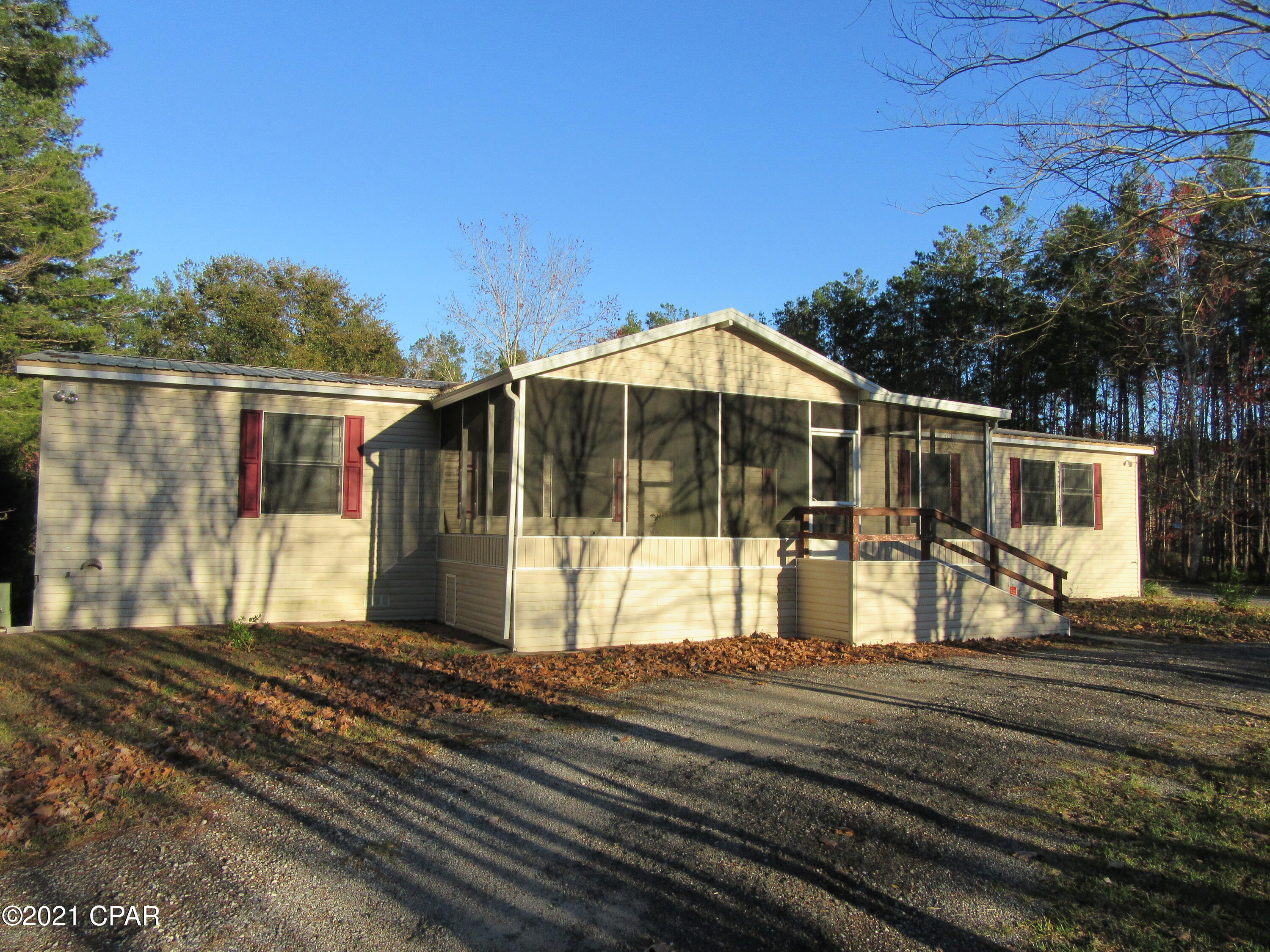 Country living at it finest ! This 4 bedroom 2 bath Mobile home on almost a full Acre and over 2400 Sq. Ft, has room to roam. Features detached work shop and another detached storage building for all of your needs. Large screened front porch and also a huge screened rear patio for your enjoyment. All property sizes and ages are approximate, please measure and/or verify if important.

School assignments are subject to change, please check with Bay County for most accurate information.

Deposit is the same as the rent. Pets allowed with owner approval and NON REFUNDABLE pet fee applies per pet. Breed restrictions apply.
