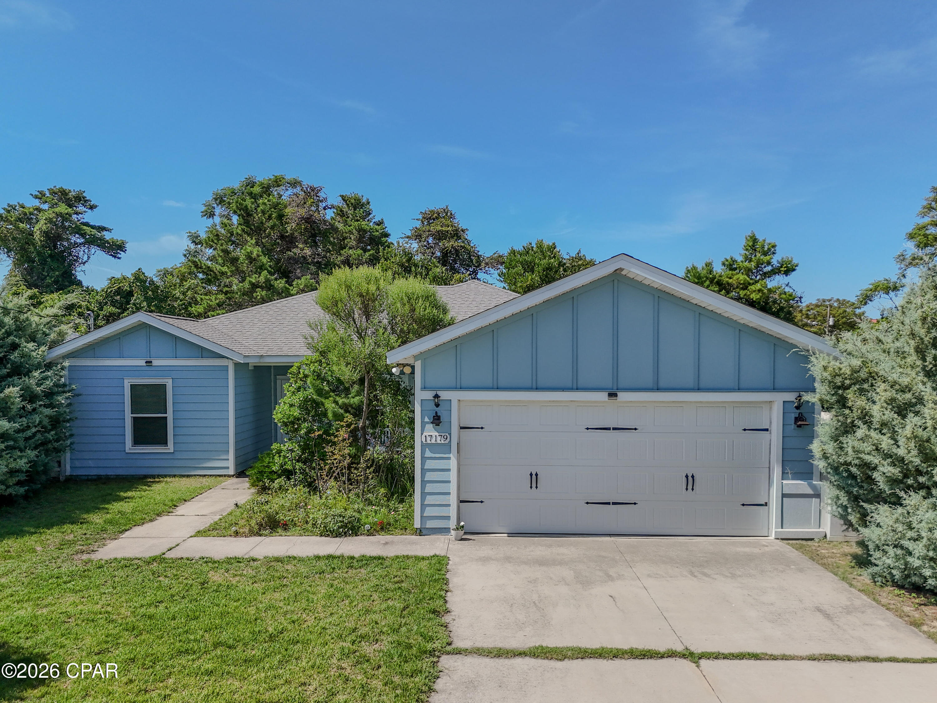Nestled in a quiet neighborhood, this beautifully maintained home offers the perfect combination of privacy, comfort, and convenience. With no neighbors directly across the front or behind the property, you'll enjoy a peaceful setting that's hard to find. The home's location near the local police station provides added peace of mind.

Inside, you'll find a desirable split-bedroom floor plan designed for both privacy and functionality. Luxury vinyl plank flooring flows throughout the home, offering durability and a modern, cohesive look with no carpet to maintain.

Step outside to the spacious covered back porch, the perfect place to relax or entertain family and friends. Whether you're hosting backyard cookouts, birthday parties, or game-day gatherings, this outdoor space is ready for every occasion.

Located just minutes from Pier Park, you'll have quick access to shopping, dining, entertainment, and the beautiful white-sand beaches that make Panama City Beach such a sought-after destination.

If you've been searching for a home that offers privacy, a functional layout, modern finishes, and an unbeatable location, this one checks all the boxes!