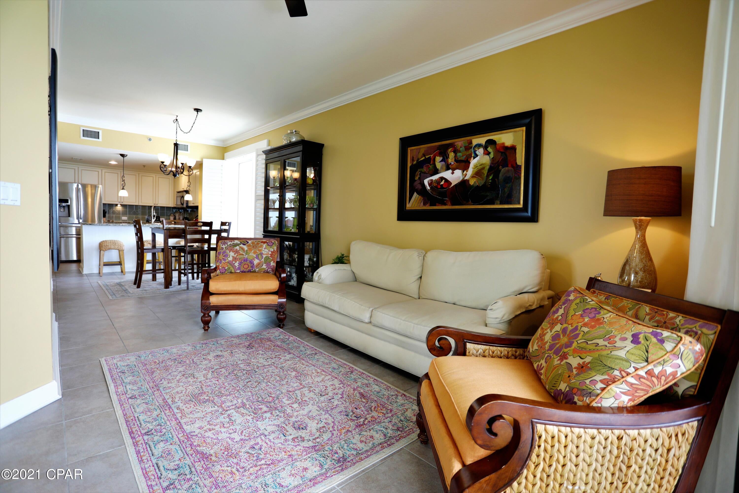 'CURRENTLY UNDER CONTRACT, SELLER ACCEPTING BACKUP OFFERS. This beautiful Gulf front condo at Grand Panama is perfect as your home or a great vacation rental. This 3 bedroom, 2 bath with bunk nook unit sits on the preferred East corner of the building.  Enjoy spectacular Gulf views from the kitchen, dining area, living room, primary bedroom suite and the oversized balcony. This is an absolutely gorgeous, fully furnished (minus a few exclusions) turn key condo with upgraded cabinets, granite countertops, new stainless steel appliances, new flooring in the bedrooms and a new HVAC and water heater in 2020. You do not want to miss out on this one! Enjoy the resort's 2 pools, tiki huts, fitness facility, business center, event center, and more, but especially the sugary white sand beach!