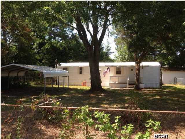 ALL MEASUREMENTS ARE APPROXIMATE. On private fenced-in lot. Centrally located. *2 bedroom, 1 bath, AVAILABLE NOW Some Pets OK with non refundable fee, covered parking, covered front porch. NEW Vinyl in Kitchen and Bath area & NEW Carpet in Living room!