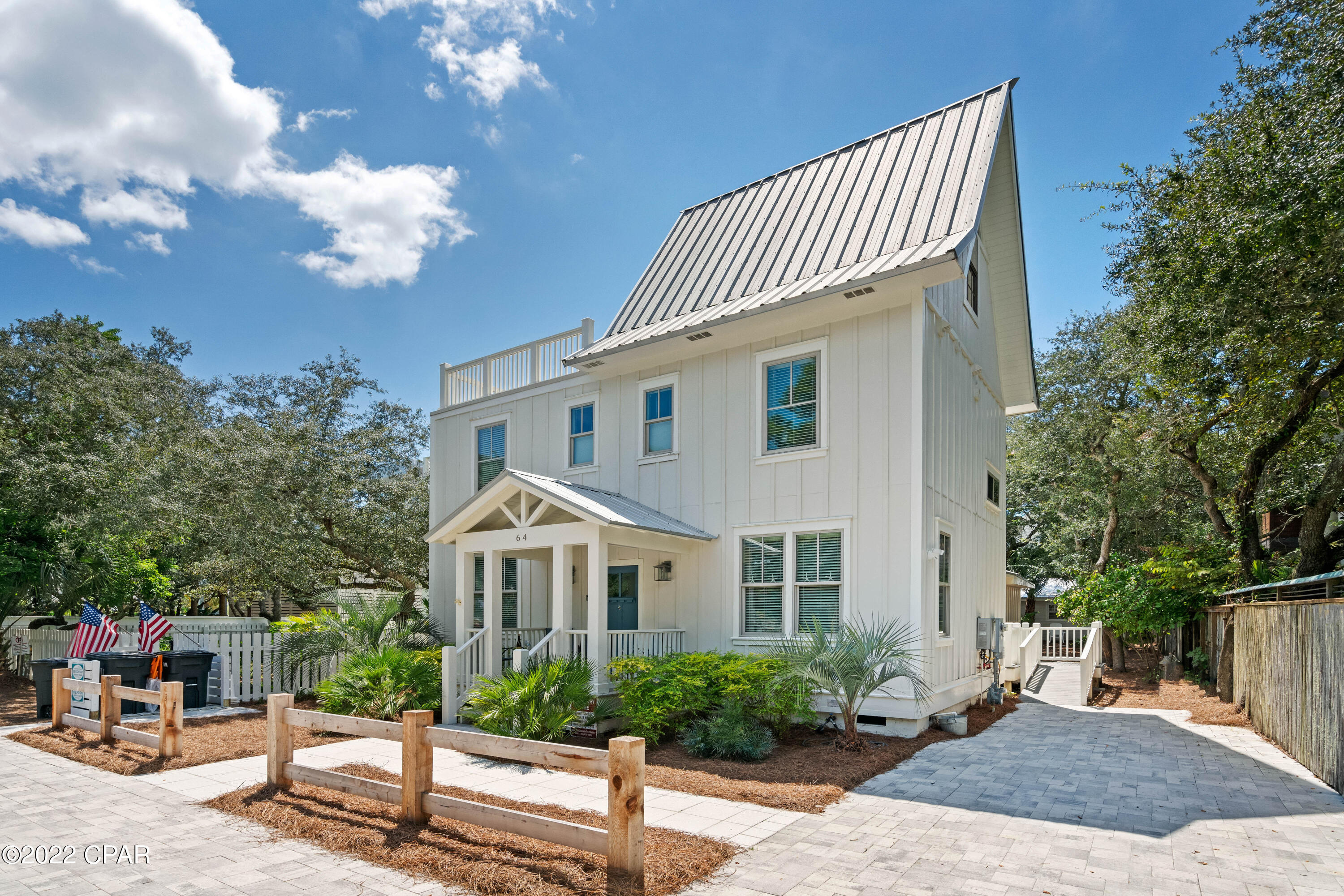 CURRENTLY UNDER CONTRACT, SELLER WILL CONSIDER BACKUP OFFERS

MAIN HOME PLUS PRIVATE COTTAGE! The main home is 2910 sq ft. with 5 beds and 4.5 baths. The cottage, which is not attached to the main home, is 560 sq ft. The cottage offers 1 bedroom and 1 full bath with a family room, full kitchen, laundry room, an outside shower and a separate entrance. The main home has been recently updated with a new kitchen, bathrooms, paint, flooring, wiring, plumbing, 2 HVAC systems, appliances, roof and much more. The cottage has a new roof. If you're looking for convenience, look no further. This property is steps to Western Lake, two beach accesses and restaurants like Red Bar, AJ's and Chiringos. At the main house, you can relax on the front porch with your morning coffee and see the peaceful Western Lake. As you enter the home, you will love the spacious family room with a dining area that opens in the kitchen. The large kitchen has ample room for an island and is adjacent to a sitting or game room. Also, off the kitchen is a mudroom that offers a 1/2 bath, full size laundry room and a door to the side yard for outdoor grilling. As you continue past the kitchen, you have a bedroom on the left and one on the right with ensuite baths, one with a gorgeous new shower and vanity. The main door to the backyard is at the end of this hallway. Continue up to the second level on hardwood treads, you will have 2 lovely additional bedrooms and 2 full baths. Proceed to the 3rd floor for a retreat to another bedroom or sitting area with a gorgeous wood A-frame ceiling that overlooks the large patio. Parking is convenient on the paver driveway and in front of the home. The backyard is large enough to put in your own private pool. Behind the fence in the backyard, you will see the precious cottage. As you come back from the beach, rinse off at the outdoor shower or enjoy your privacy with outdoor seating. This cottage backs up to an alley for ease of getting to the beach, Western Lake or restaurants without interfering with the main house guests. The main house has an accessibility ramp on the north side and the first floor is fully accessible including the master bath.
These 2 properties can be rented at different times. Call today for a showing. Listing agent or associate to accompany for all showings.
