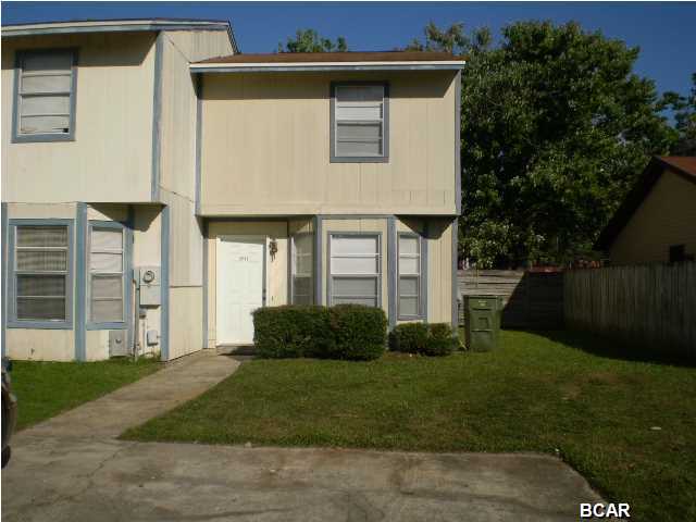 Great end unit 2 bedroom 1 1/2 bath townhome centrally located near everything...shopping, banking, restaurants and schools. Brand new paint and flooring throughout. Privacy fenced shaded courtyard with deck and outside storage room. This unit would be a great starter home or would be a good rental for investors. Don't let this jewel get away!