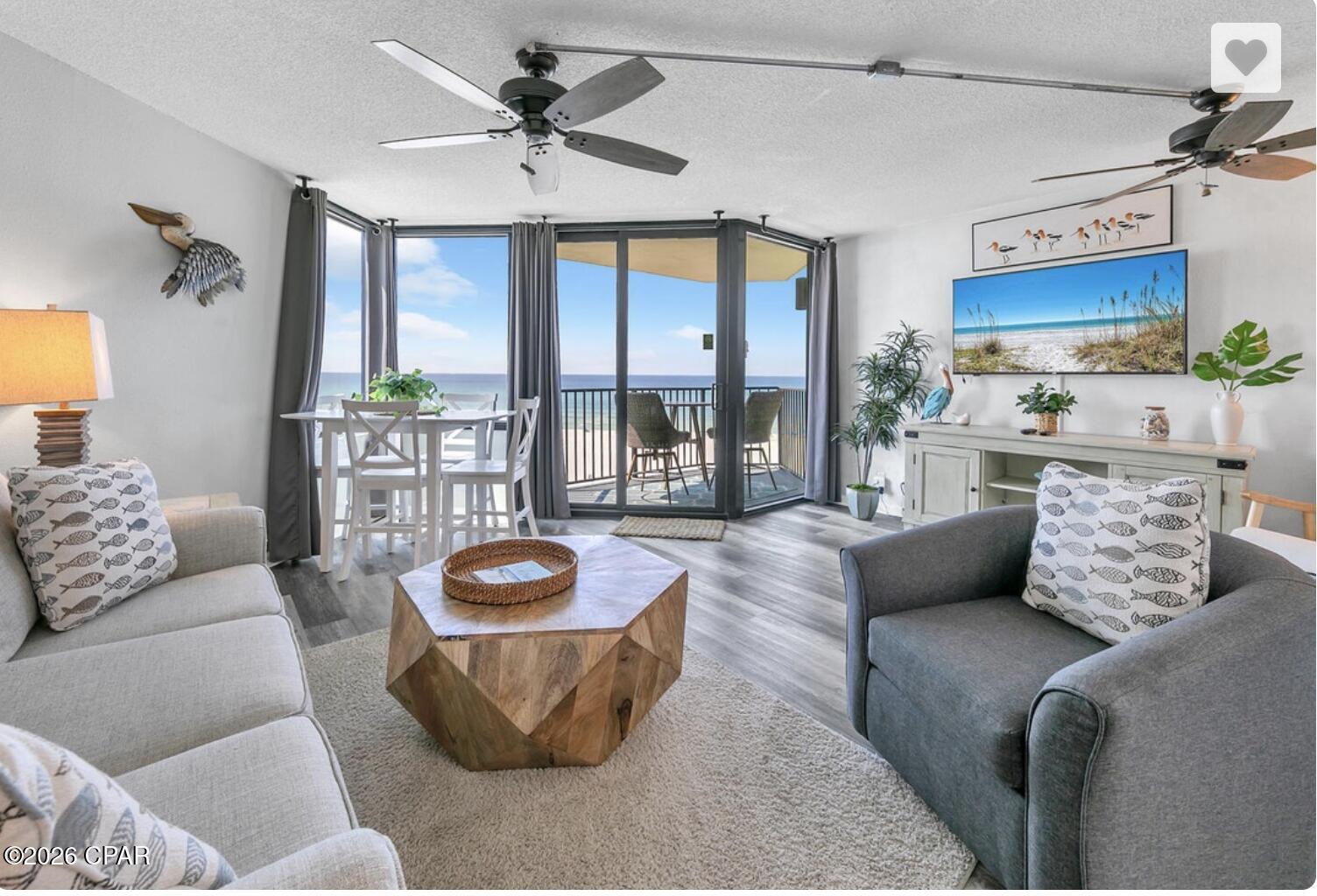 Something is not right here!! Look at the renovation on this one and look at the price!! I think you might be able to have your dream come true!! Discover the ultimate coastal escape in this stunning Gulf front condo, where the rhythm of the waves and the warmth of white sandy beaches become your everyday reality. From the moment you step inside you are greeted by the kind of luxury that turns a vacation into a lifestyle and a lifestyle into a smart investment.

The completely remodeled kitchen sets the tone with sleek quartz countertops, beautiful white cabinetry with updated handles and matching white appliances that bring a clean crisp coastal aesthetic to the heart of the home. 

The shiplap detailing adds that signature beach home character while luxury vinyl plank flooring runs throughout combining beauty with the durability that a Gulf front property demands. The standout spa-inspired shower fully tiled with a glass door enclosure elevates the bath experience well beyond your ordinary condo. And the furniture? This one comes curated with higher end pieces that photograph beautifully and keep guests coming back.

Positioned in the best C location in the building your direct Gulf front views stretch across the shimmering emerald waters and the pristine white sandy beaches that make Panama City Beach one of the most sought-after destinations on the Gulf Coast.

Sunbird delivers on every level with a fitness center, attentive security, tennis/pickleball courts, fountains, Washer/dryer facilities, grills, three pools including one heated pool and a recently redone center pool along with a building that passes all inspections and an exceptional HOA team keeping everything in top condition. Walk to Pineapple Willies, Walmart, Waffle House and a number of dining options and soon Tootsies rising where the iconic Spinnakers once stood.

This is not just a place to escape. It is a proven income-producing asset in one of Florida's most popular beach markets. Whether you are searching for your personal coastal retreat or a high-performing short-term rental investment this condo checks every box.