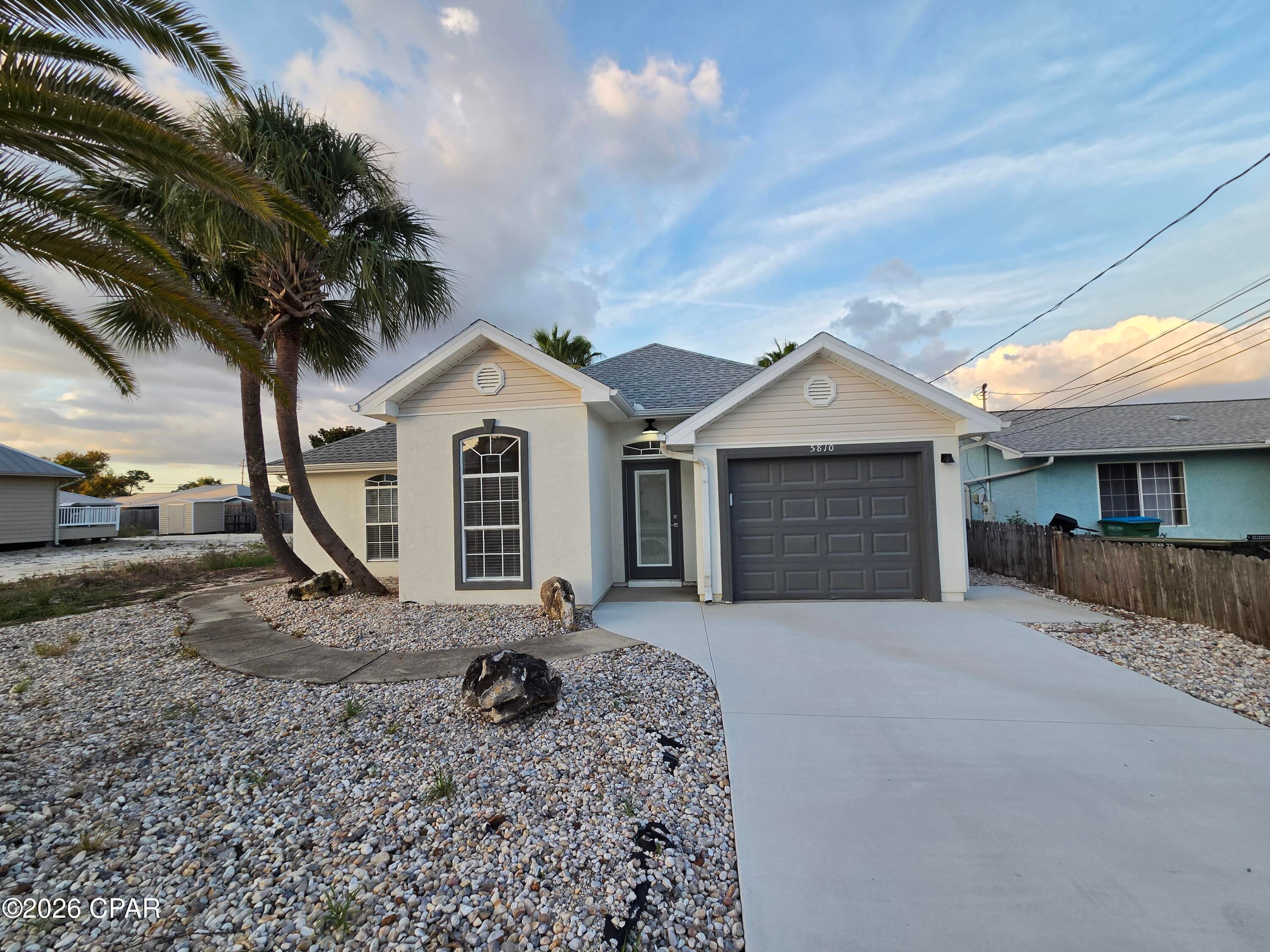 Freshly upgraded and ready for move-in! This gorgeous 4-bedroom, 2-bathroom home in the sought-after South Lagoon neighborhood puts you within walking distance of the beach access. Interior Highlights include brand-new LVP flooring, fresh paint, and stainless-steel appliances. Chef's Kitchen: Equipped with all appliances, great counter space, breakfast bar, and a pantry. Private Master Suite: Located at the rear of the home with an ensuite double-vanity bathroom. Flexible Layout: 3 additional bedrooms (2 large, 1 cozy--ideal for a home office). Outdoor & Extra Perks:1-car garage, fully fenced backyard. Secure your spot near the beach before it's gone! *Dogs negotiable with $250 pet deposit, $50 pet fee, and $25 monthly pet rent per pet. Property is on septic tank.