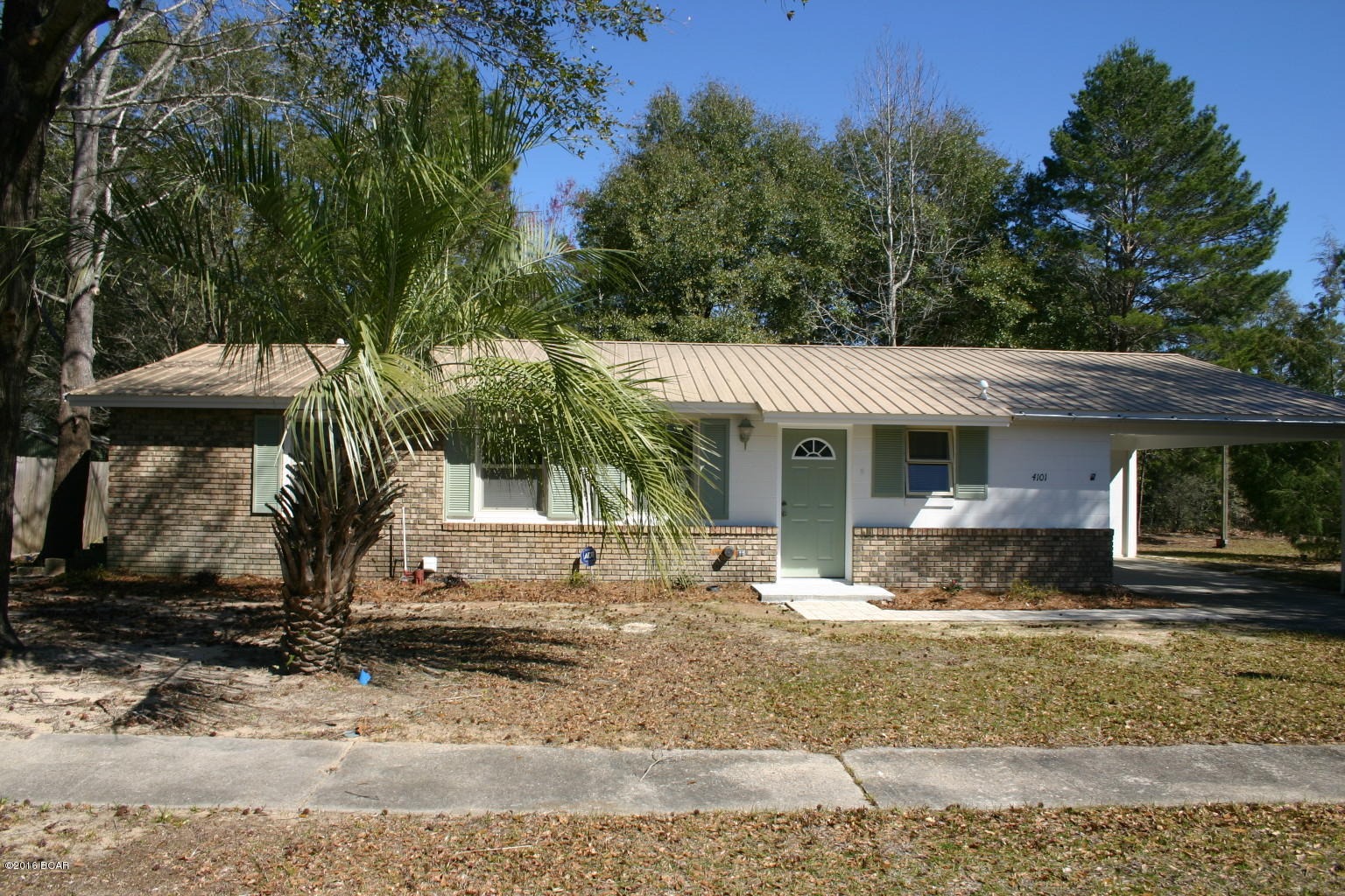 Don't let the indicated age of this Sunny Hills home fool you! This home has been completely renovated and upgraded. Kitchen was renovated 11/2015 with new cabinets and counter tops. New dishwasher, stove, and microwave installed. New carpet and paint also. The huge family room that was added to the back of the home features 2 large skylights and a beautiful bay window that provide lots of natural lighting. This room will be a favorite spot for relaxing and entertaining. Even has a wet bar. Off of the family room is a screen room for enjoying your morning coffee. Split floor plan and the master bedroom was created by adding on to the home. Features a spacious hallway, washer and dryer hookup, and a large walk in closet. Home has a very comfortable feel to it and lives larger than it looks. There are 2 newer hot water heaters to service the home and the metal roof was installed approximately 5 years ago. This home is move in ready. 
Sunny Hills is located 25 miles north of Panama City and 18 miles south of Chipley. This community features a popular 18 hole public golf course and many fine fishing and recreational lakes. Make your appointment to see this one. You will be surprised at the condition and the quality renovations.