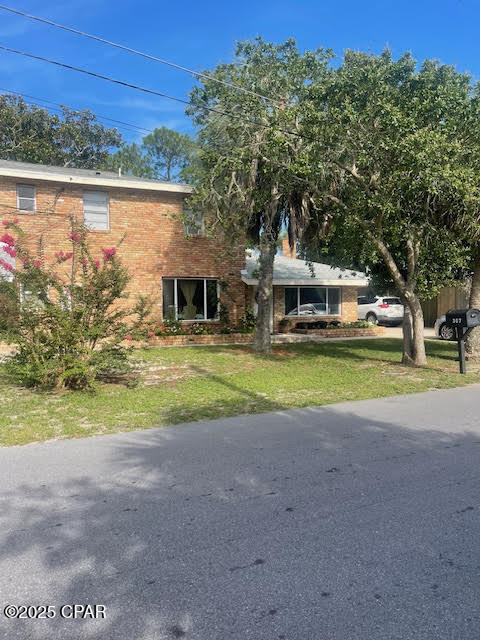 WHAT A DEAL! Fabulous property located 1 block from the beach. Easy walk to beach access. This triplex has a 2 bedroom/2 bath downstairs and a 2 bedroom 2 bath upstairs with a private entrance. The back unit detached has a 3 Bedroom 2 bath. All have been remodeled . The detached unit is approximately 1430 Sq feet. The 2 bedroom downstairs is approximately 1258 sq feet and the upstairs unit is approximately 988 square feet. This is a perfect location for beach lovers. Close to great restaurants such as Mike's Diner and Salty Sue's. Walk to both of them. Great opportunity for someone.  Huge lot 158 x 205 (.74 acres). All measurements are approximate. Lot is large enough where more units can be built on the property.