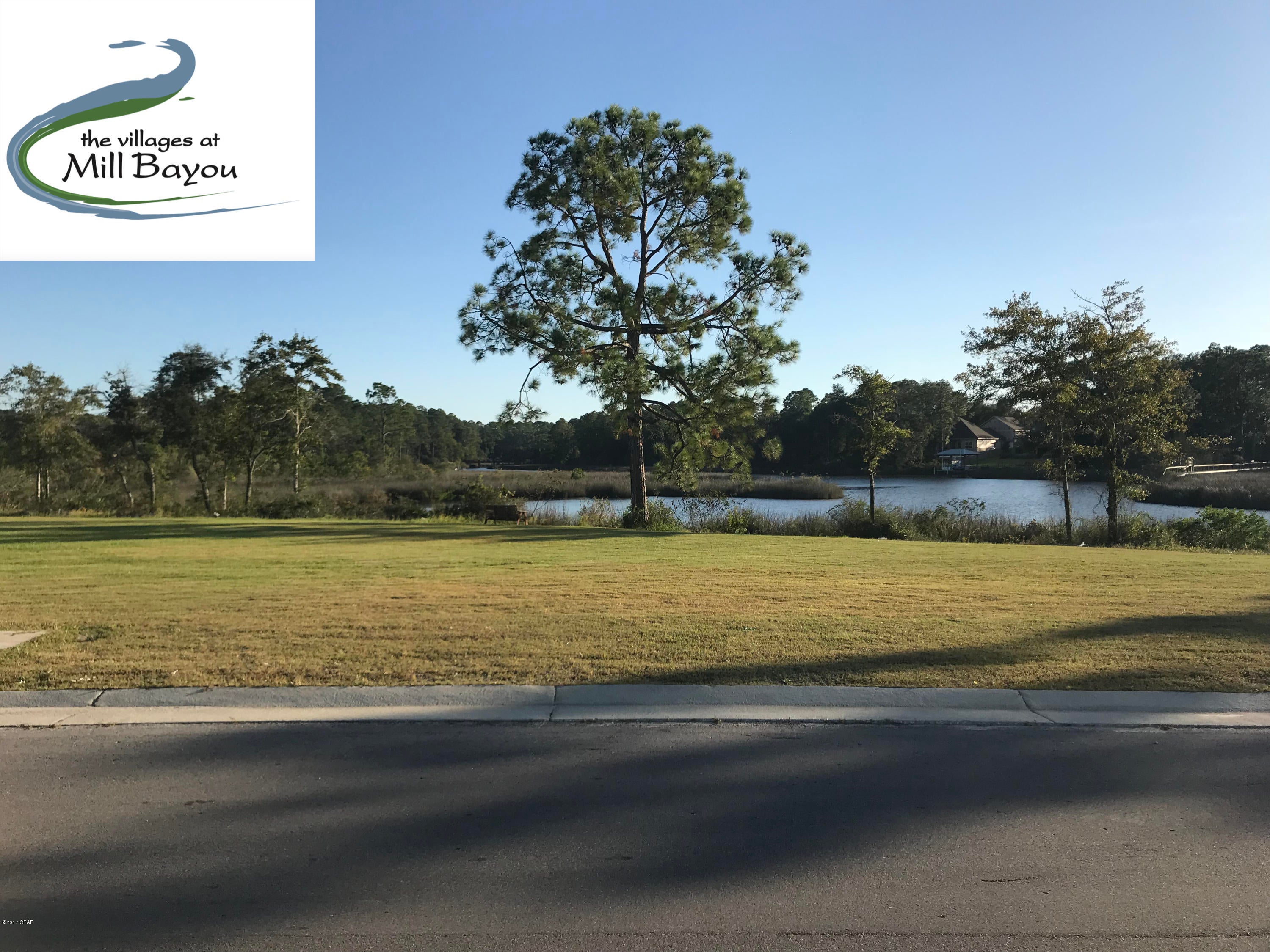 Premium lot located in Lynn Haven with unobstructed waterview that faces Mill Bayou and backs up to Shoreview Pond. Neighborhood has pool, firepit, sidewalks, street lights, wide streets for on street parking, 2 dedicated parks, conservation land, and ponds throughout. The development contains Deerpoint elementary on the north and North Bay Haven Charter Academy within walking distance on the south. Lot has potable water, reuse for low cost lawn and landscape irrigation, power, sewer, and natural gas. Ready for your waterview dream home.