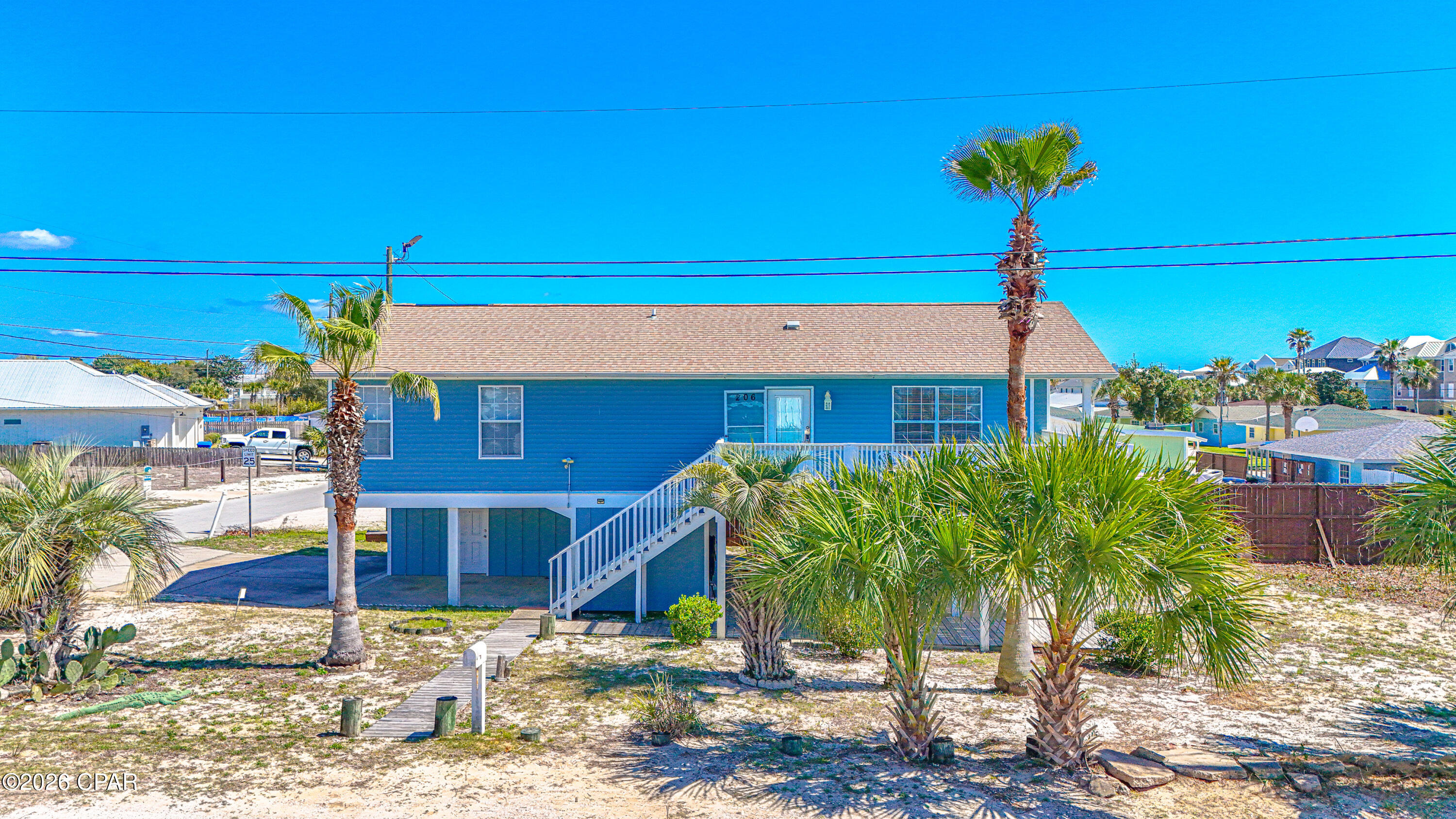 Taking Backups the phrase 'CURRENTLY UNDER CONTRACT, SELLER WILL CONSIDER BACKUP OFFERSAre you dreaming of a place near the beach with income potential? If so, 206 Shasta Street is definitely worth a look. Located in the desirable Kiska Beach community on the quiet west end of Panama City Beach, this unique property offers two separate living quarters and is just 500 feet from Beach Access 92!  The upstairs level features a 3 bedroom, 2 bathroom layout with a spacious porch where you can enjoy peek-a-boo Gulf views and coastal breezes. Downstairs, you'll find a fully equipped studio apartment with its own kitchen and full bathroom, making it perfect for guests, extended family, or short-term/long-term rental income. The home sits on a spacious corner lot in a golf cart friendly community known for its laid-back beach lifestyle. The downstairs area also features a large covered patio with a 17' x 12' storage room that provides plenty of space for beach chairs, bikes, paddleboards, and all your beach toys! Recent updates include a new AC unit and fresh exterior paint in 2024, plus a roof replacement in 2016. Inside, there is no carpet, making cleanup easy after long days at the beach. One of the best things about this home is the location! You're just minutes from Carousel Supermarket, Thomas Donuts & Ice Cream, the new Aldi, Publix, and Pier Park, with 30A only about 3 miles away. Northwest Florida Beaches International Airport is also just 25 minutes away, making travel simple for owners and guests alike. Whether you're looking for a primary residence, second home, or a rental investment, this west end beach property offers flexibility, Florida charm, and an unbeatable location. Adding a pool? not  an issue sewer on Shasta west of home and on Bataan.
