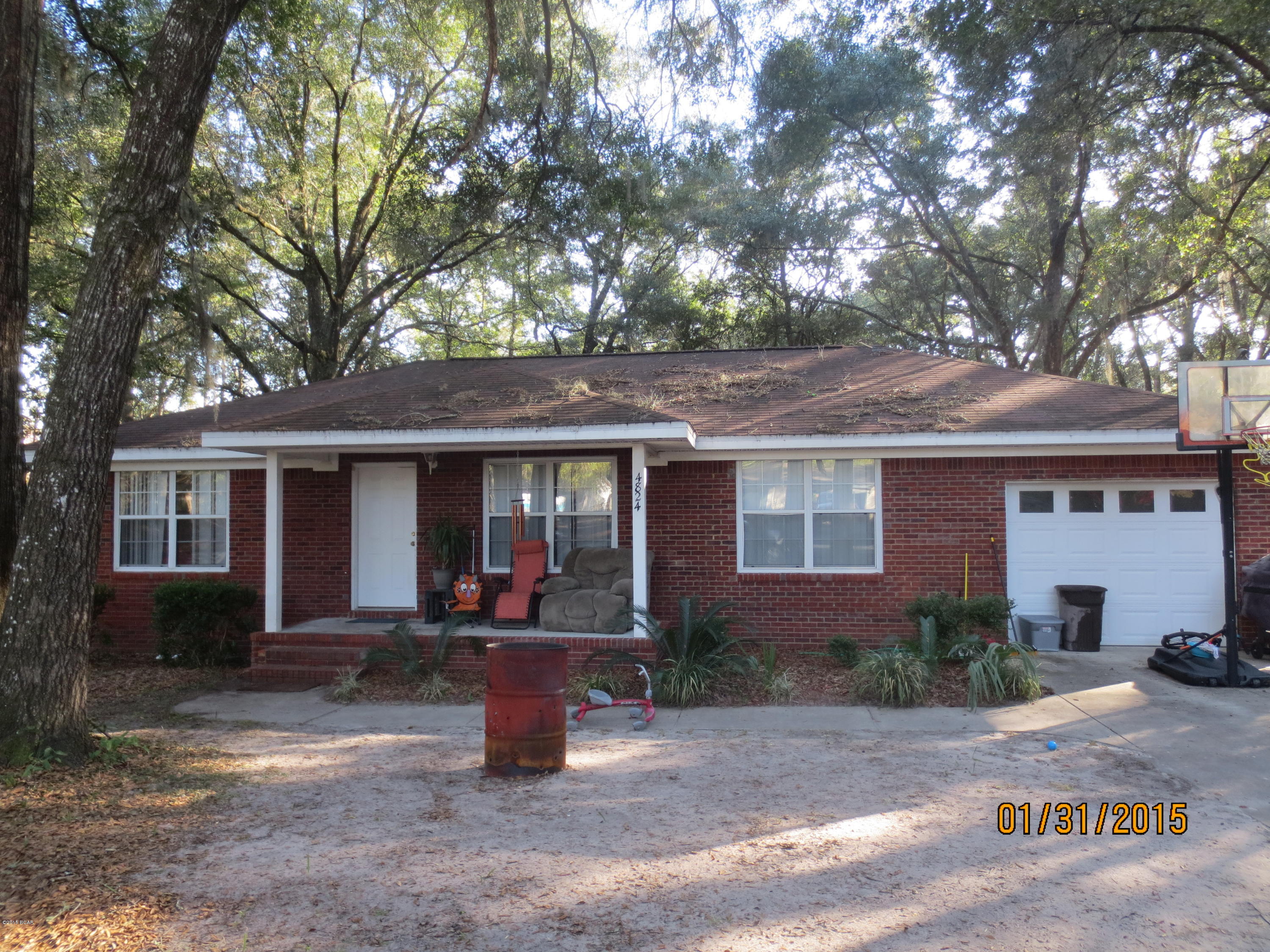 This is a Bank approved short sale and is priced below market value.All brick 3 bedroom 2 bath home built in 2002. Home is located in Lakeshore Heights within 1/2 mile of a public boat ramp. Enjoy the day on Deer Point Lake fishing and boating or a day of canoeing on Econfina Creek either way you will love your new home. Located on a 100 X 150 shaded completely chain link fenced lot on a quiet street. You can make lots of memories here and have great weekend cookouts grand times on the water. Call today for your private viewing.