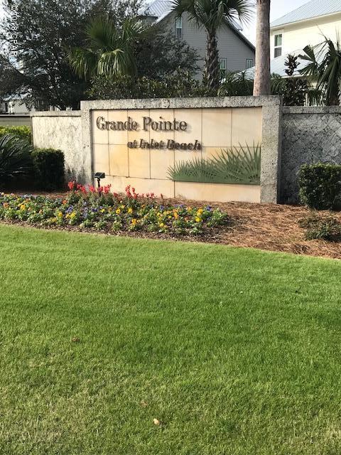 Beautiful residential lot in the community of Grande Pointe at Inlet Beach.  Perfectly located just inside the Walton County line near Bay County making it a great location for someone who works in either county.  Grande Pointe at Inlet Beach is a single family residential community consisting of one hundred and forty-six heavily wooded lots located in the magnificent Inlet Beach, Florida. It is bordered to the north by Lake Powell, which is the largest coastal dune lake in Florida. The entire east side shares a border with the State of Florida Nature Preserve. To the south and only minutes away are the emerald waters of the Gulf of Mexico and to the west, watch beautiful sunsets and enjoy an abundance of shops and restaurants.  Amenities include an Amenities Pavilion, which features a complete kitchen, special events area and a private conference room. Located behind the Pavilion is a luxurious community pool, nature path to the lake and a park area with benches for relaxation. There is also a community dock located on Lake Powell.  All of the homes built must adhere to architectural standards for a coastal cottage look  HOA fees are $389.85 per quarter and there is a new buyer fee of $250.  Make this lot the location of your dream home!
