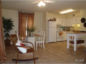 Must see this great condo in a lagoon front community. Recently remodeled with paint, recent appliances, washer-dryer. Large master bedroom with walk in closet. Move in ready. This is a great unit for a first time home buyer, or someone looking for a beach get away. Community has pool, dock: bring your boat right up to the dock on the lagoon to load and unload your supplies for your day on the water. Just a few minutes and you are in the Gulf of Mexico. Like to golf? then this community is for you. Just a short distance to Baypoint, Hombre, Holiday and Signal Hill golf courses. North Lagoon has sidewalks which is perfect, for walking, running or riding bikes. This is a second floor unit which affords you the quiet you are looking for. Although complex has boat slips this unit does not