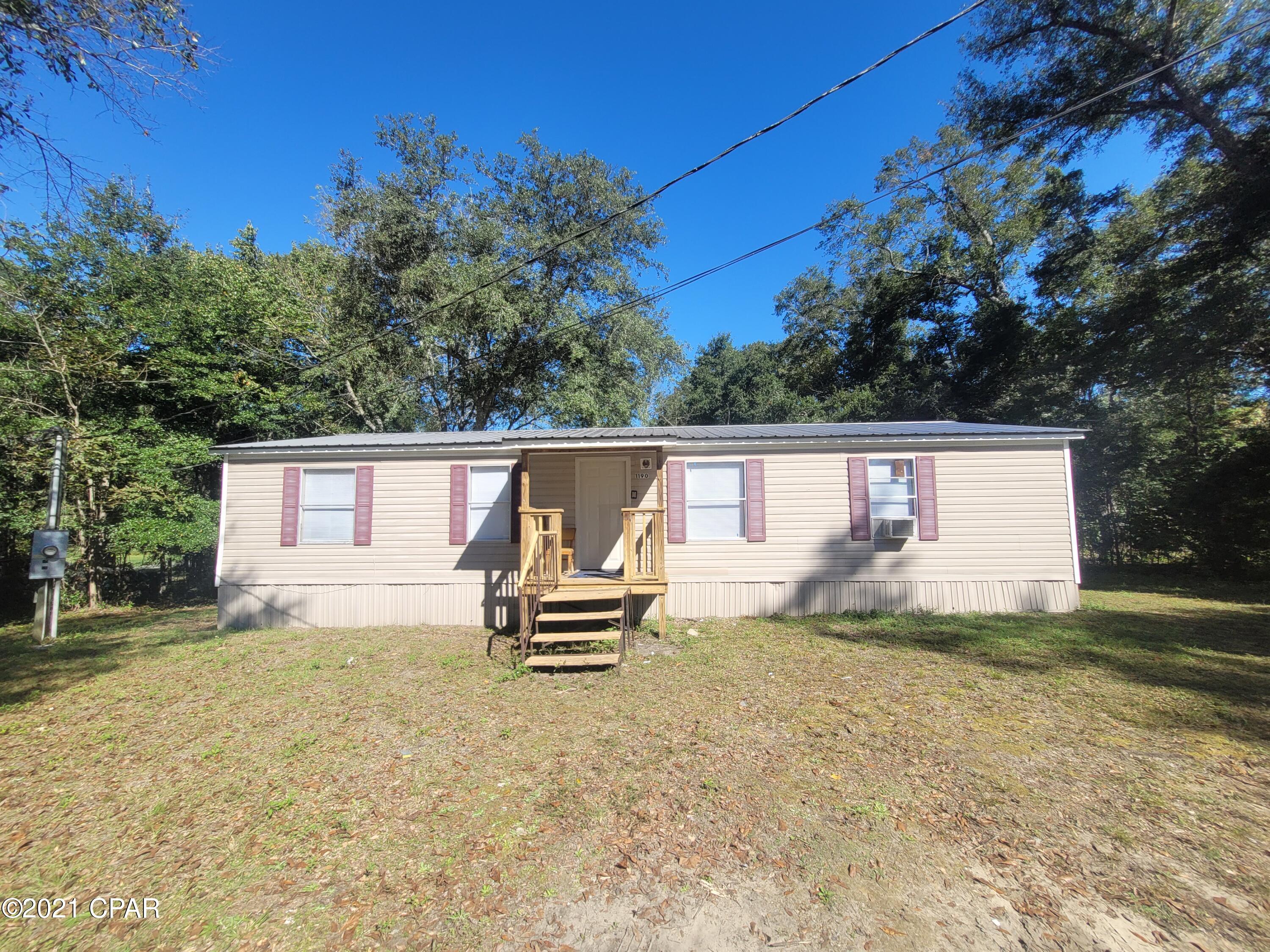 Great potential for investment or starter home with this 3/2 dwmh in the city limits of Chipley. Home offers an open floorplan with kitchen, dining area and large living room. Split floor plan has master with a master bath on one side and 2 additional bedrooms and full bath on the other. Small lot to maintain. City utilities. Home is currently used as a rental. Close to medical facilities, grocery shopping and other small town amenities. Cash or Conventional financing only.