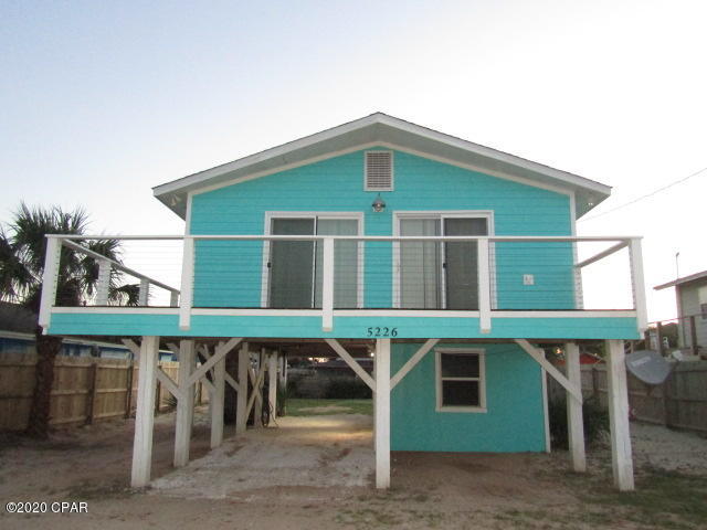 BEACH HOUSE- 3 bedroom, 1 bath home on pilings featuring open living/dining combo, recently updated cabinets and appliances, double sliding doors leading to balcony with view of the gulf. Large storage room located at ground level. Property is walking distance to the beach. Property is on septic system. Fenced yard. **$250 pet deposit/$50 pet fee/$25 monthly pet rent.