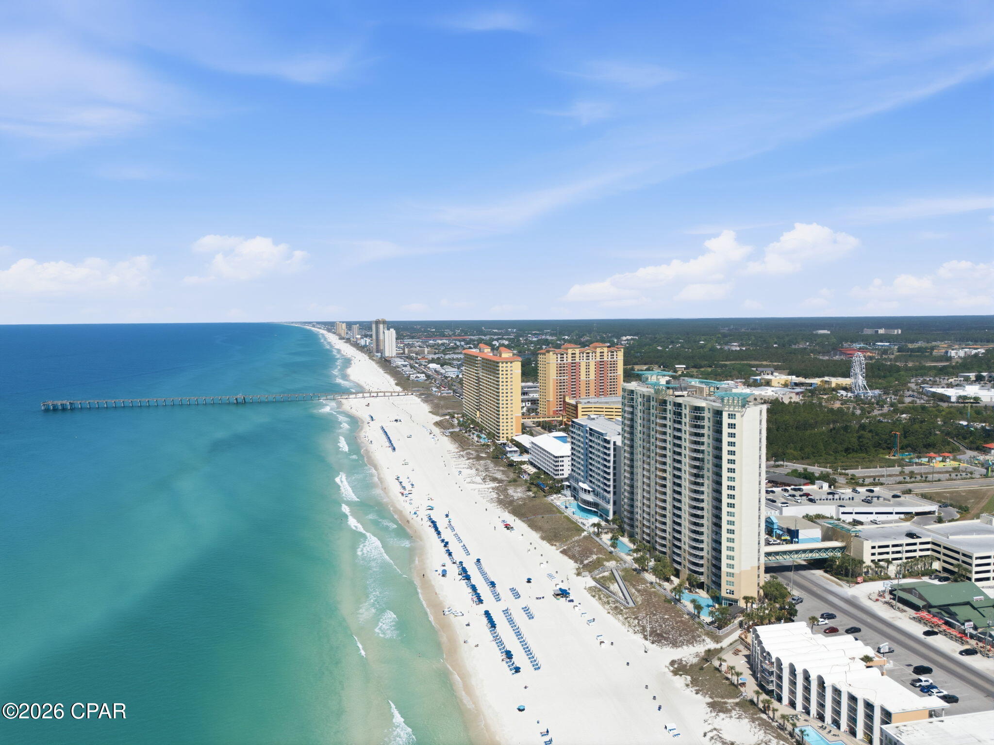 This is not your typical beach condo. Aqua 1002, a 3BR/3BA with two Gulf front primary suites, has just been completely re-imagined by one of Nashville's hottest interior designers, creating a sophisticated Gulf-front retreat where modern coastal luxury meets boujee mountain chic.

Step inside and the contrast is intentional. Outside, it's bright Florida sunshine, sugar-white sand and emerald-green water. But after a long day in the hot sun on the beach, isn't it nice to be inside, cool off and lower the lights? That's where Aqua 1002 really hits differently. Two foot tile flooring, rich, moody finishes, warm natural textures, dramatic lighting, designer furnishings and bold architectural details create a cool, sophisticated retreat from the sun - more boutique Nashville hotel than cookie-cutter beach condo.

The showpiece is ALL THREE spa-inspired bathrooms, where the designer went well beyond the typical beach-condo renovation. The space features distinctive Higold sinks, bold cabinetry, dramatic black fixtures, oversized tile, designer lighting and large walk-in showers surrounded by striking floor-to-ceiling finishes. The combination of gold, black and natural textures creates a boutique-hotel atmosphere that has to be seen in person.

From the moment you enter, the custom design sets this condo apart. Rich, moody finishes are balanced with warm coastal textures, statement lighting, designer furnishings and carefully selected architectural details. The result is boujee mountain chic meets high-end coastal aesthetic - bold, sophisticated and completely unexpected at the beach. The remodeled kitchen features dark cabinetry, light countertops, stainless appliances and bar seating, while the open living and dining areas flow directly toward the Gulf and a private balcony with panoramic beach and water views.

Located on the 10th floor of Aqua, Unit 1002 has one of the best floorplans because of the width of the living room and dining room, combining a highly desirable elevation with sweeping Gulf views and one of Panama City Beach's most sought-after locations. Step outside and you're at the beach, Top Golf is nearby, and Pier Park is just a short walk away for shopping, dining, entertainment and nightlife.

The expansive Gulf-front balcony provides plenty of room for outdoor dining, morning coffee, sunset cocktails or simply watching the emerald water and beach below. Inside, the designer aesthetic continues throughout with a sophisticated mix of black, bronze, gold, natural textures and warm neutral tones, creating a distinctive luxury-resort feel with unmistakable Nashville personality.

Whether you're searching for a Panama City Beach vacation home, second home, Gulf-front condo or short-term rental investment, Aqua #1002 offers something increasingly difficult to find: a professionally designed, freshly remodeled property in a premier beachfront resort that already feels special the moment you walk through the door.

3BR/3BA Panama City Beach Gulf front. 10th floor. Walkable to Pier Park. Absolutely not cookie-cutter. Yes this one's a little more expensive. But when you see it, you'll know where that extra money went. Nothing wrong with the others, but this one is what you deserve and guests will want to reserve for their vacation.

If you've been waiting for an Aqua condo that stands out from the competition, this is the one you'll remember.
