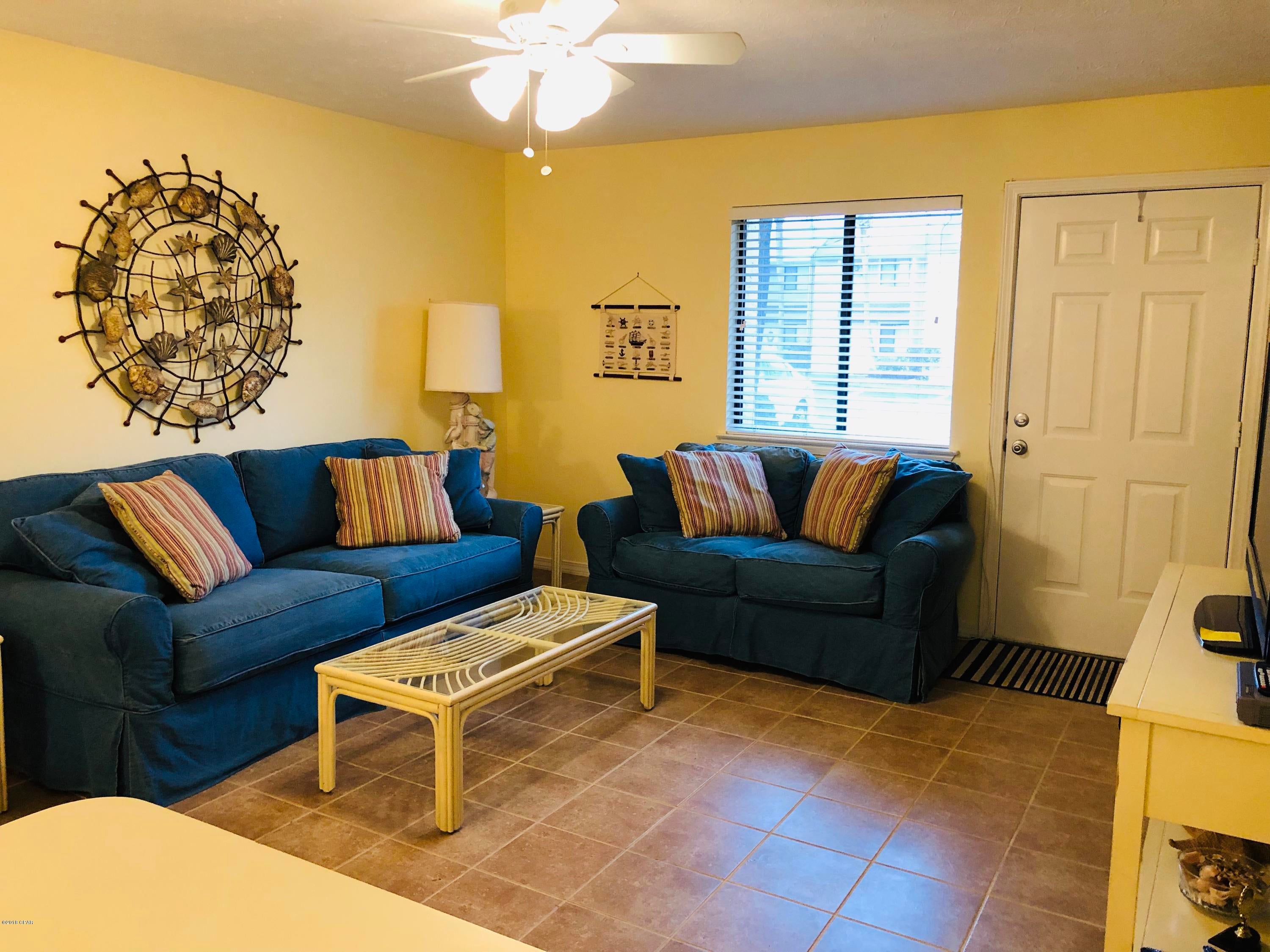 This beautiful townhome is located on the east end of the beach in the highly sought gated Gulf Highlands Beach Resort. This 2-bedroom 2.5-bath townhome sits across from the canal and is just steps from the beach. Comes furnished with beach decor. Downstairs and bathroom are tiled and upstairs is carpeted. Very low HOA fees with many amenities. 11 pools (4 heated and one on the beach), 4 tennis courts, workout room, mini golf, playgrounds and shuffle board.  Gulf Highlands is located in the heart of PCB and is in walking distance of many attractions.