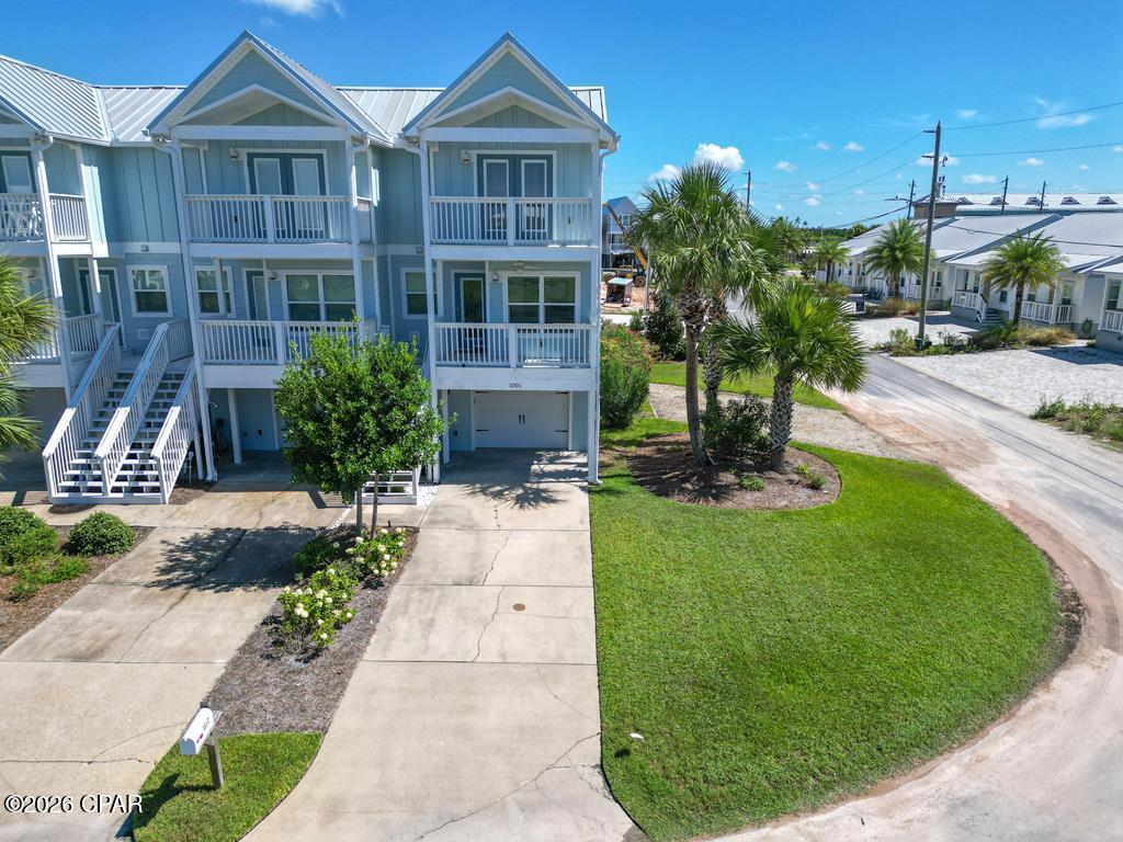 Beautiful 3 bedroom, 3.5 bath town home comes fully furnished and offers stunning Gulf views. Designed for comfort and convenience, this home features multiple levels of living space, including an open-concept main floor with a bright living area, dining space, and well-appointed kitchen--perfect for entertaining or relaxing after a day at the beach. The master suite offers private Gulf views, a spa-like bath with double vanities, soaking tub/ shower. The ground floor includes a private bedroom and bath, ideal for occasional visitors or guest seeking their own space. Each guest bedroom has its own private bath, providing plenty of space for family and friends. A private garage, ample storage, and outdoor balconies make this property ideal for full-time living or a vacation retreat. Just steps from the beach, this town home combines Gulf views, generous space, and modern comforts in a prime location.