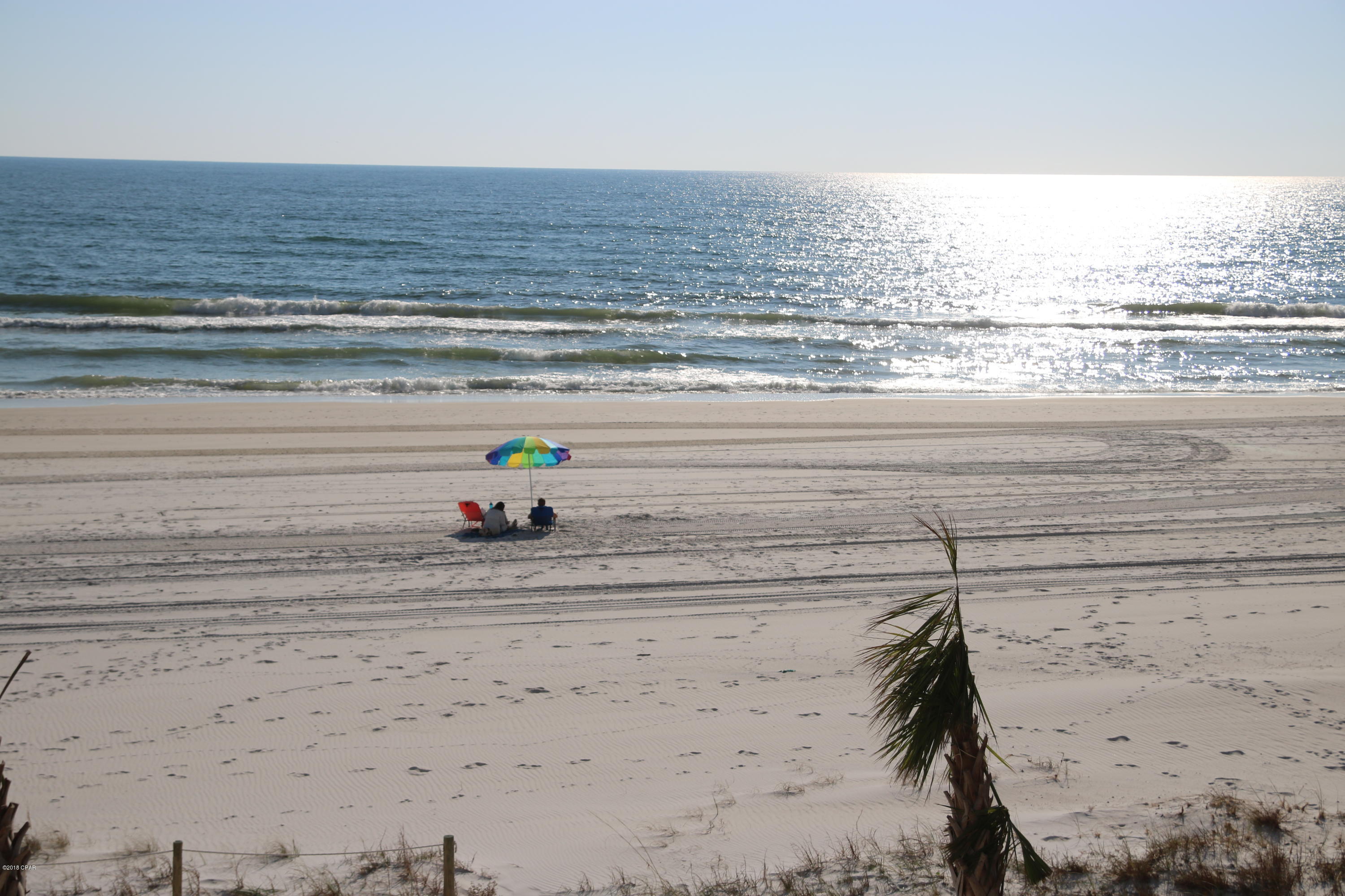View of the GULF will knock your socks off.....no, seriously, it will AMAZE you!! WALK TO PIER PARK!!!! Darling 1 br condo, well taken care of......so close to the GULF, feels like you can reach out and touch it!! Both A/C units recently replaced. Electric bill under $70 - in the summer!! Complex is only 3 stories high, no elevators to wait on! Call your favorite Realtor to see this affordable, GULF front condo - quickly!!!

No damage from Michael! Measurements are approximate, verify.