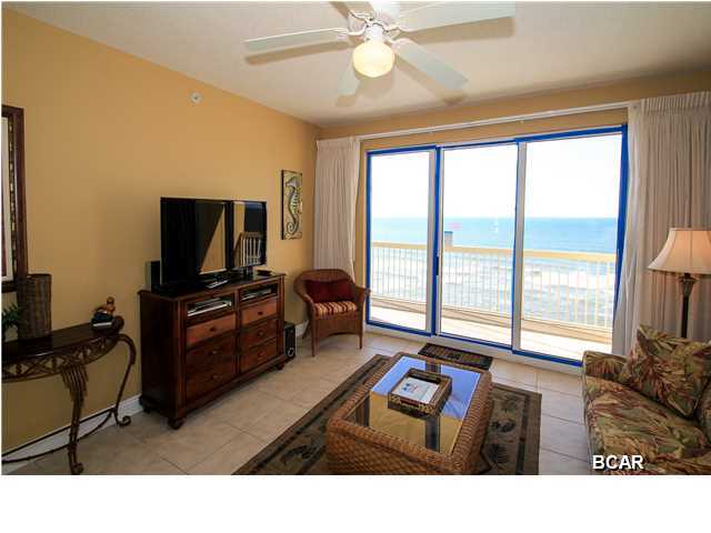 This is a stunning, well-kept unit in Calypso's highly desirable West Tower with proven rental history. Breathtaking 14th floor Gulf and sunset views can be seen from the living/dining, kitchen, and master bedroom. Upgraded tile floors in the living/dining, kitchen, and bathrooms. Heavily upgraded kitchen features granite countertops and stainless steel appliances. Bunk room functions like a 3rd bedroom, with custom built-in bunk beds and closet. Beach chair service (2) for use of the condo owners or guests from Aquatic Adventures is prepaid for the full season in 2015. New HD flat screen TVs and HD DVD players purchased in 2012. Watch the sunrise while you make breakfast in the heavily upgraded kitchen, spend the afternoon swimming in one of Calypso's two Gulf front pools or walk a  few more yards to put your toes in the sugar white sand, then watch the sunset from the private balcony before heading to Pier Park less than a half mile away to explore endless options for shopping, dining, and recreation. This fully furnished unit is rental ready, and already has several reservations for 2015.