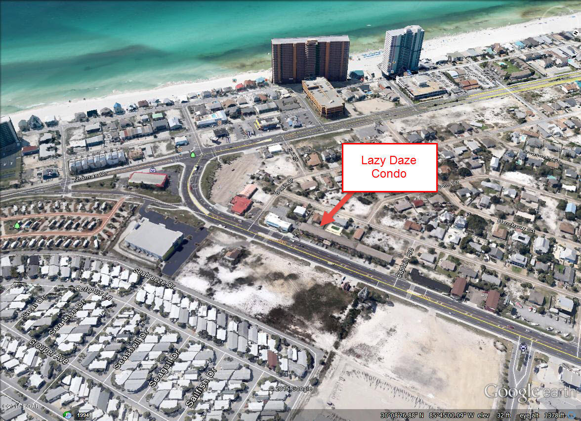 Walk to the beach! This 2 bedrooms 1 Bath condo nestled on Thomas Drive is just 2 blocks front the beach! This unit makes the perfect getway spot or investment property.  The kitchen has granite counter tops, tile back splash, full size refrigerator and cooktop . Hardwood floors in living room and kitchen. This condo sleeps up to 5 and is sold fully furnished.