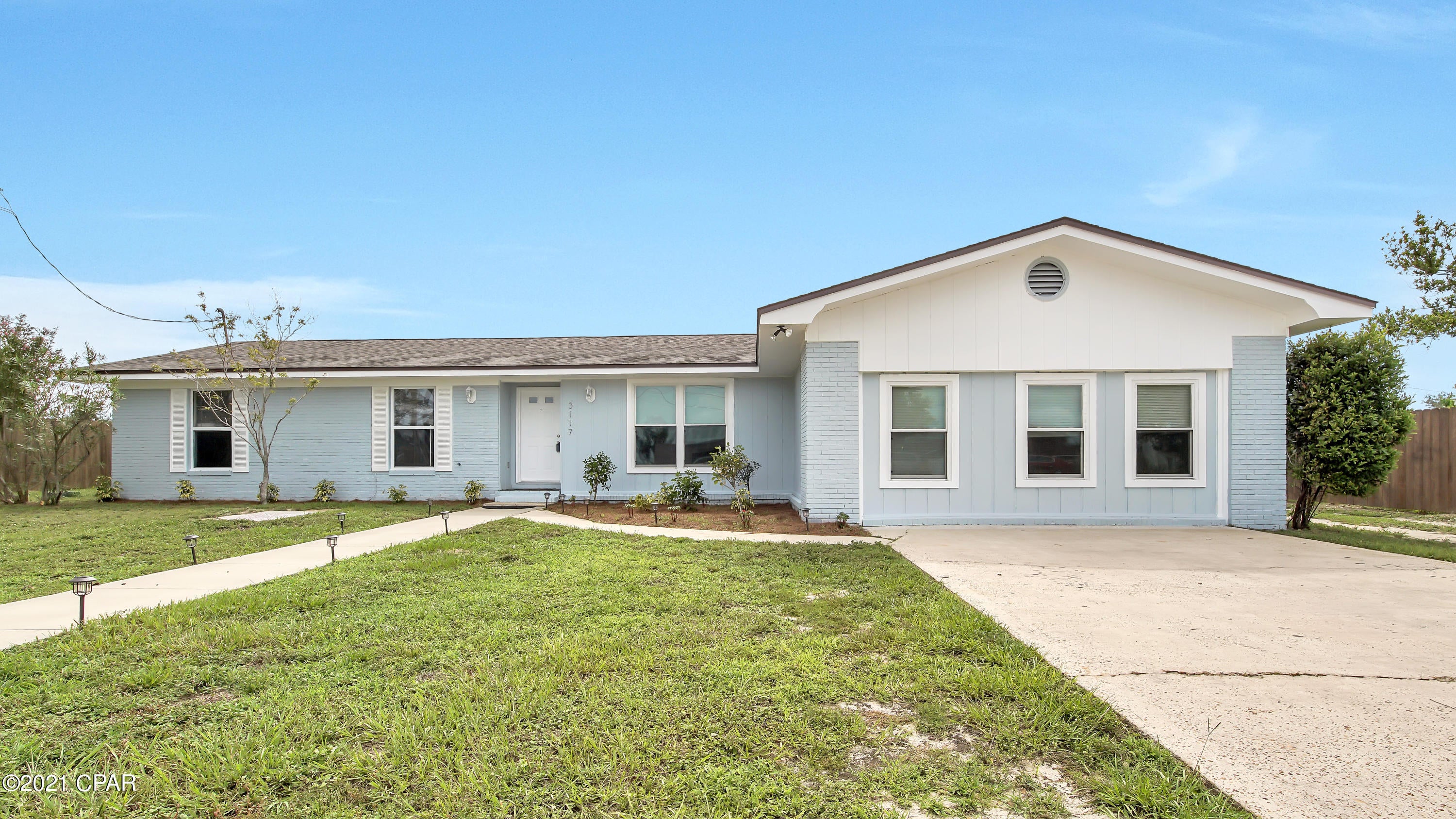 BEAUTIFUL 5 bedroom, 2 bathroom remodeled home in the heart of Panama City for less than $300,000. Perfect place if you need a home for your family and business!! Being on Jenks Avenue, you could advertise your business for free! NEW interior and exterior paint, NEW flooring throughout, NEW 6' privacy fence. New tile flooring and tub/showers in the bathrooms. Plus a NEW roof in 2019, new air conditioning and heating unit & attic insulation in 4/2021. Plenty of room for kids to play, add a pool, and to park additional vehicles in the back and an RV outlet on the side. Two living areas, plus a separate dining room. You could easily make a couple of offices in the home also.



Plus there is a circular driveway that was added for additional parking. And a detached 16' x 20' building in the ba