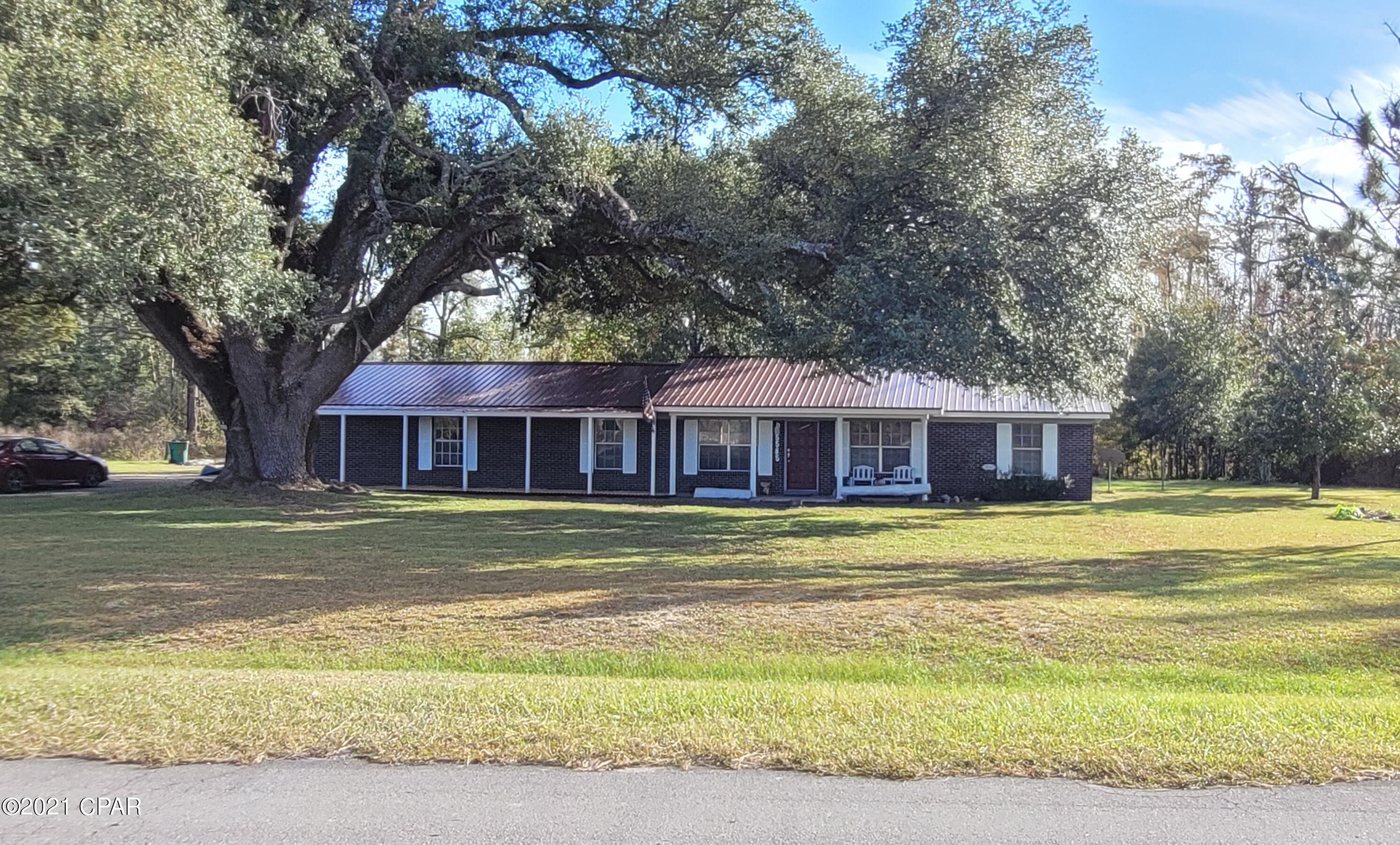 Are you looking for a MOVE IN READY home in Marianna?? STOP..... Look no further than this cutie!! With an open floor plan this Light Bright and Airy 1,587 sq ft brick home has 3 bedrooms 1 Bath, a den that could be a 4th bedroom if needed. There are so many new items to list. New roof, HVAC, kitchen countertop and new flooring thru out home. Freshly painted, new well house & gazebo. There is a back patio to relax on to watch the kids play in the yard. Located on a paved 1 acre lot. This home is priced to SELL and will not last long! Call today for your personal showing!!