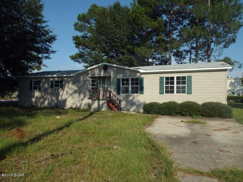 REDUCED!!!  Large three bedroom two bathroom manufactured home on a corner lot near highway 231 offered as is .All sizes are approximate or taken from other sources please verify accordingly.