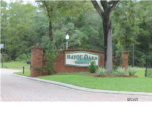 If your looking for a building lot, look no further...this beautiful lot in the gated community of Bayou Oaks in the Deerpoint area is waiting for you! Don't miss out on this one!!! This lot is high and dry, in a gated subdivision with brick and iron entrance, beautiful mature oak trees, pavered roads and just footsteps away from the private community pier and boat dock on Deerpoint Lake.