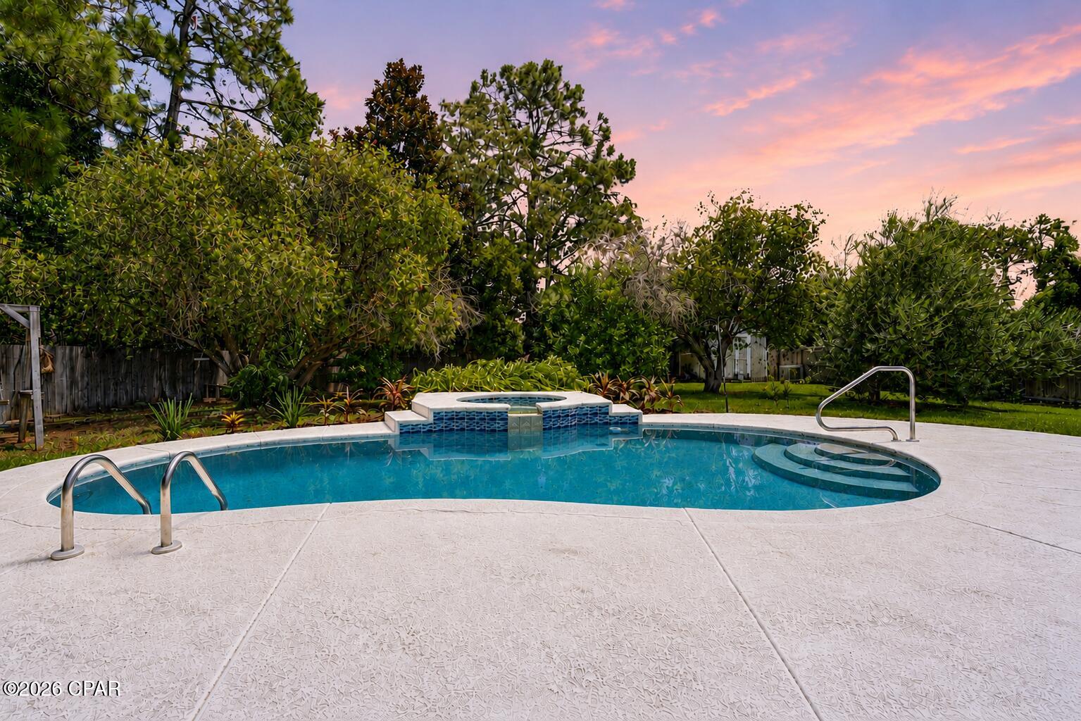 Private pool, spa, major updates, and short-term rental potential in Panama City Beach!

Welcome to 3624 Betsy Lane, tucked away in the Upper Grand Lagoon area of Panama City Beach. This 3-bedroom, 2-bath home offers the combination buyers are looking for--an established residential setting, private outdoor space, major system updates, and the flexibility to use the property as a primary residence, second home, or short-term rental.

Major improvements include a new roof in 2020, new HVAC in 2020, new windows in 2020, and a new pool pump in 2026, taking care of several of the big-ticket items buyers often ask about.

The backyard is where this property really shines. Enjoy your own in-ground swimming pool and spa, surrounded by established olive, orange, and fig trees that give the outdoor space character and a true Florida feel. The pool also has components in place for pool heat; the previous heater was not replaced, giving a future owner the option to add a new heater if desired. Spend the afternoon by the pool, unwind in the spa, pick fresh fruit from your own backyard, or entertain friends after a day at the beach.

Inside, the living room offers another unexpected feature--a functional wood-burning fireplace currently concealed by the electric fireplace, giving a future owner the option to uncover and enjoy the home's original fireplace.

Located on a dead-end residential street, you're close to the best of the east end of Panama City Beach, including Grand Lagoon, boating, fishing, marinas, restaurants, St. Andrews State Park, the beach, and Naval Support Activity Panama City.

Whether you're looking for a full-time home near the water, a PCB getaway, or a property with short-term rental potential, 3624 Betsy Lane offers something increasingly hard to find--a single-family home with a private pool and spa, established backyard, major updates, and no condo lifestyle required.

Beach. Boat. Pool. Spa. Backyard. Repeat.