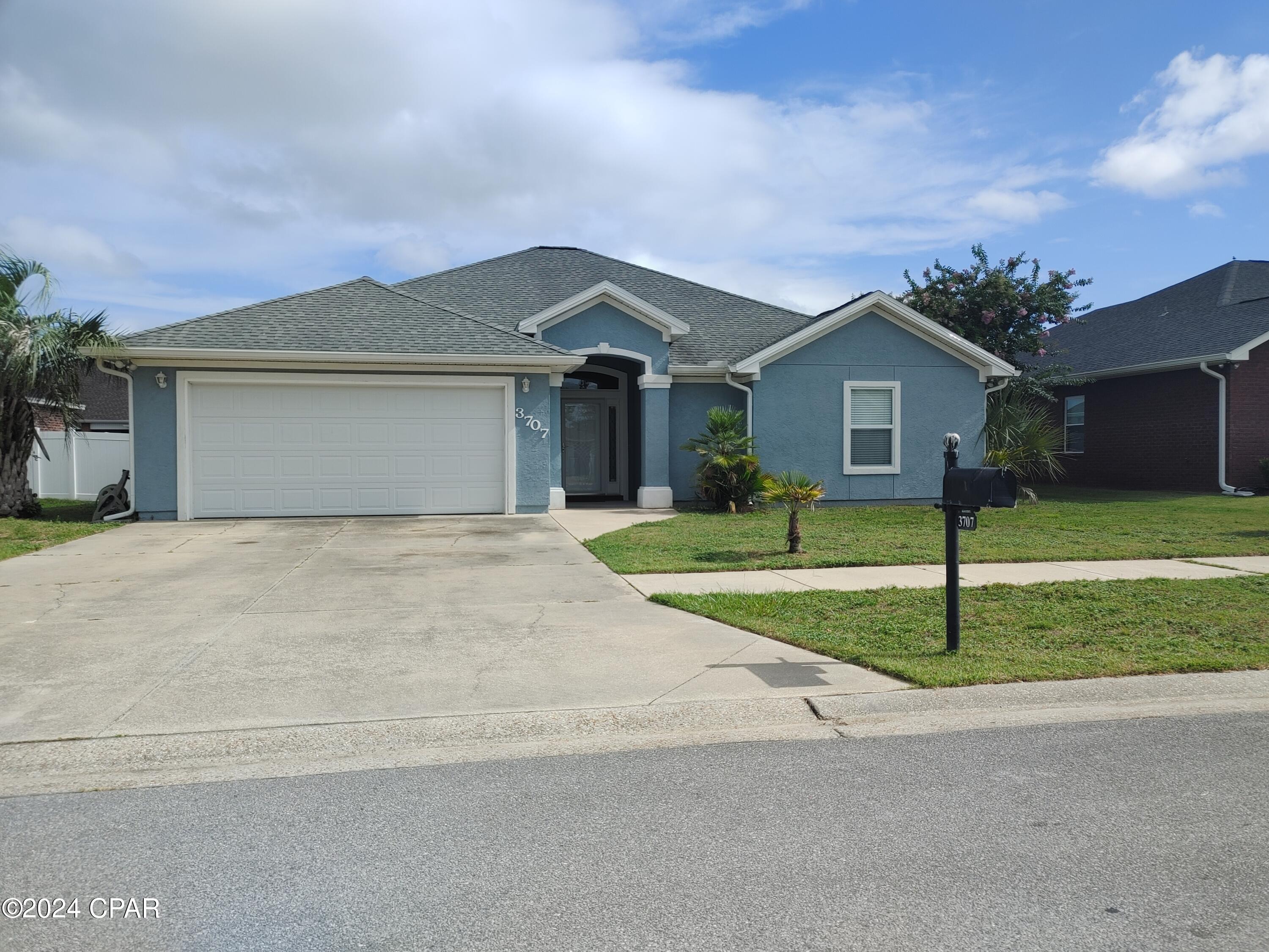 This spacious home is located in the wonderful subdivision of The Hammocks, centrally located to shopping and dining and this subdivision has just recently renovated the community pool. The home features vaulted ceilings, an open floor plan concept, tray ceiling in the master bedroom, huge soaking tub,  new water heater and more. The converted garage created the 5th bedroom, yet still allows enough storage area to be practical. The 5th bedroom has a  new barn door on the closet entry and its own brand new mini split heat and air system and would serve nicely as a 5th bedroom. The fully fenced backyard boasts a beautiful vinyl white fence as well as covered patio area to enjoy a nice morning or evening relaxation time. Pets allowed with approval