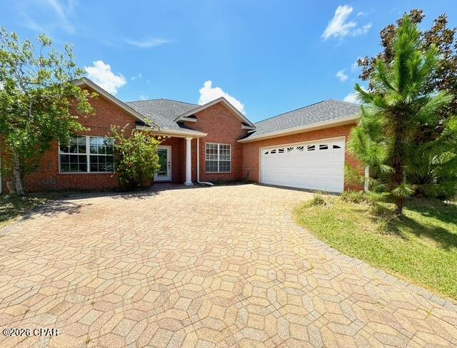 Golf Lovers Welcome! Welcome to this beautiful 4-bedroom, 3-bathroom home located in the desirable The Meadows neighborhood of Lynn Haven. This well-appointed home offers a wonderful combination of comfort, functionality, and outdoor living. Inside, you'll find an electric fireplace, walk-in pantry, spacious laundry room, and a generously sized primary suite. The primary bathroom features a large walk-in closet and relaxing jetted tub. Step outside to enjoy the screened in patio and private pool, installed in 2020-perfect for entertaining or relaxing year-round. Additional features include a 2-car garage, irrigation sprinkler system, and AT&T fiber internet. Recent updates include a 2025 water heater and 2019 roof providing added peace of mind for a new homeowner. Don't miss this opportunity to make this beautiful home in The Meadows your own and enjoy the golf-course lifestyle in Lynn Haven!