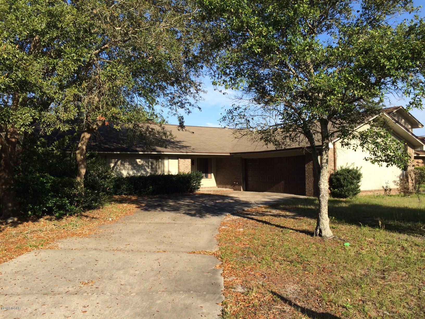 Great location for this 3 bedroom 2 bath brick home in the North Lagoon area.  This home has new carpet and new interior paint.  This home features a large stone fire place, oversized laundry room and garage along with an additional concrete drive way for parking or boat/RV.