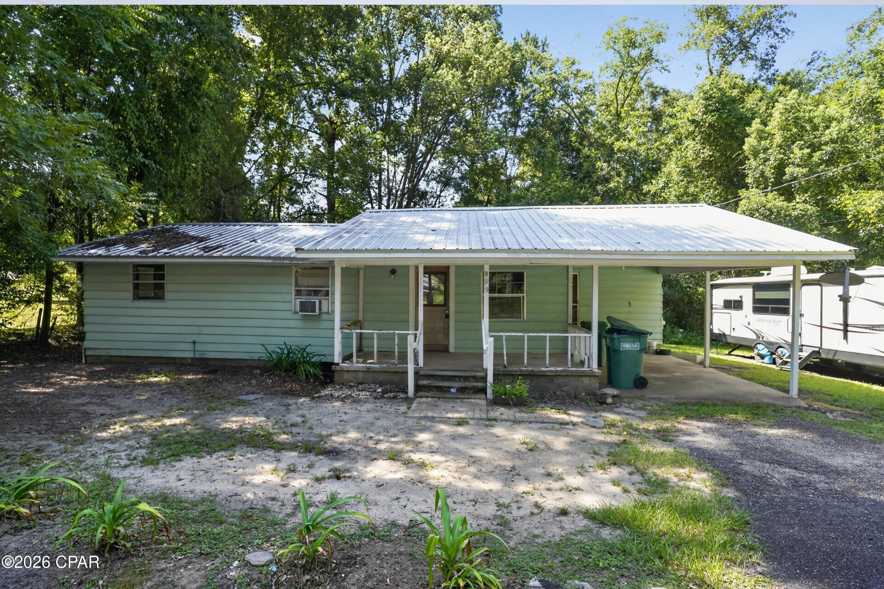 Opportunity awaits on this quarter-acre property in the heart of Bonifay, conveniently located just minutes from Doctors Memorial Hospital, Bonifay K-8, shopping, and everyday amenities.

The home is now vacant and cleared, giving buyers a straightforward look at the space and a chance to bring their own renovation vision to life. A few major improvements are already in place, including a metal roof approximately 3 years old and an updated modern breaker panel.

The interior is ready for renovation, including new flooring throughout and a complete bathroom update. Buyers are encouraged to complete their own inspections and due diligence.

For investors or buyers looking for a project, renovated comparable properties in Bonifay have sold in the $133,000-$165,000 range, offering potential upside depending on renovation scope and finishes.

Square footage is approximate per tax records and should be independently verified by the buyer. Listing agent has not inspected the interior; property information is based on seller-provided information and public records and is not guaranteed.

Property is being sold AS-IS, WHERE-IS. Buyer is responsible for all inspections and due diligence. Proof of funds required.