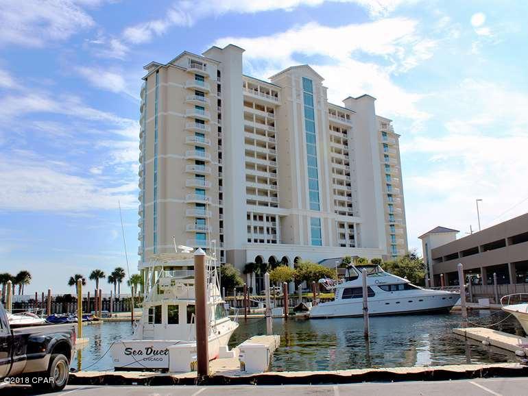 For those with discerning taste and seeking the perfect full time residence or second home, Marina Landing provides everything you've ever dreamed of. Marina Landing features floor to ceiling views of the pristine St. Andrews Bay from every room and the expansive balcony features a stainless outdoor kitchen that provides you with a true outdoor living space that is perfect for entertaining family and friends. The Chef Designed Kitchen offers an abundance of cabinetry, granite countertops, breakfast bar, stainless steel appliances and full pantry. The Master Bedroom Suite comes with a full walk-in closet, luxury master bath with separate shower and extra deep soaking tub great for those bubble baths! This spectacular property has a private deep water marina onsite and is just minutes to the pass...a boat owners dream come true. Marina Landing also features a beautiful bayfront pool and hot tub with tropical landscaping, quiet sitting areas, conference room, and health & fitness center. Just minutes to the white sandy beaches and right down the street from Pier Park, this spectacular property provides both the perfect location and the perfect lifestyle... If you haven't visited Marina Landing before now, you owe it to yourself to take a look!
