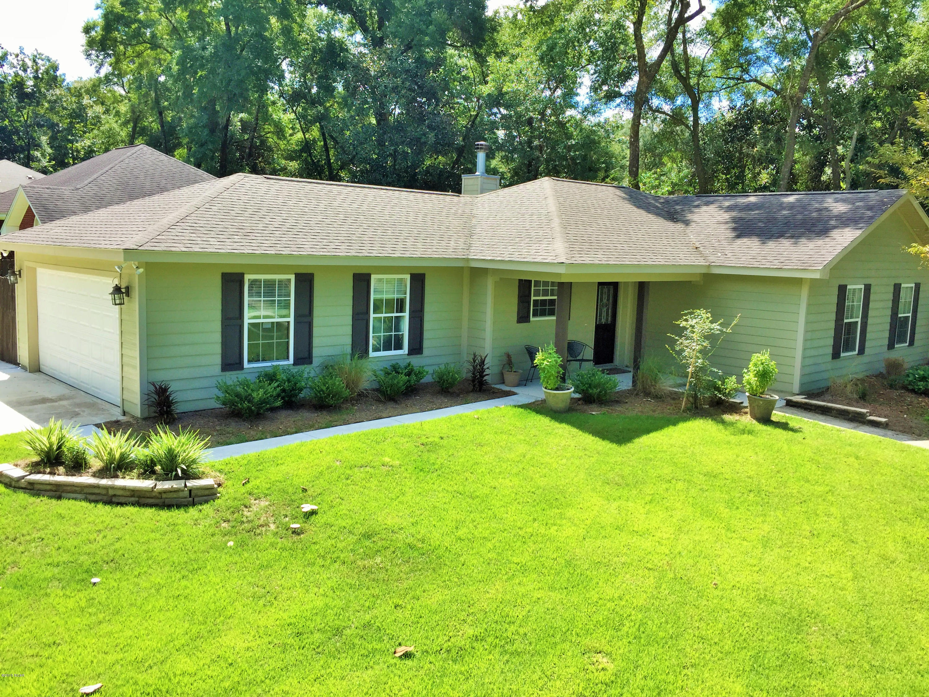 Remarkable 3/2 open floor plan home with lots of upgrades and located in the popular Deer Point area across from the lake and close to the boat landing. Home offers a large living room with built ins and stone fireplace. The living area and hallways have engineered hardwood. You will love the kitchen with it's custom cabinets, stainless Bosch appliances, granite and breakfast bar. There is a covered porch located off the living room and a fenced in back yard. There is also room for your boat and separate fenced area for dogs. 

The spare bedrooms are spacious and the additional bathroom has granite. Master bedroom is a nice size with granite and a large tub. 

Make your appointment to see this home today!! All ages, sizes including is sq. ft. is approximate. Please verify if important.